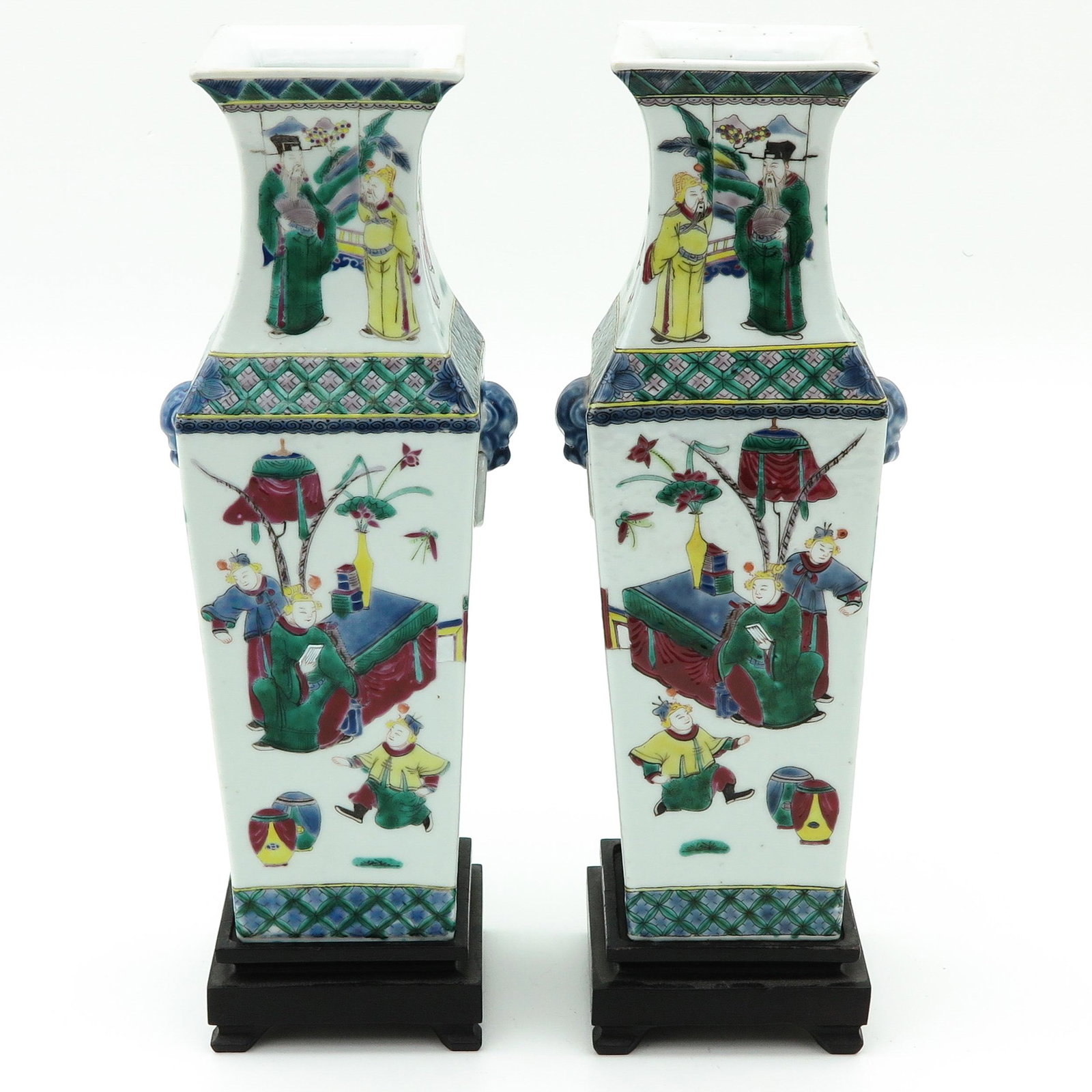 A Pair of Square Vases on Wood Base: Depicting diverse scenes of Chinese figures, vases are 30 cm. tall not including base.