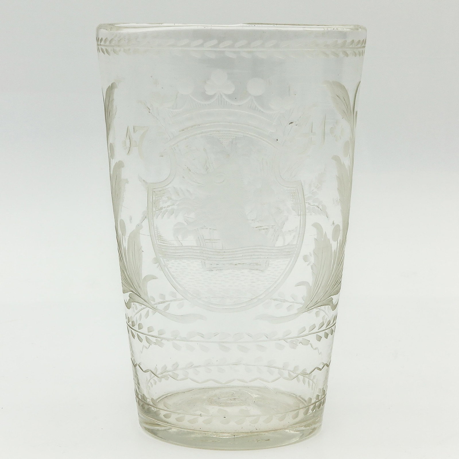 A Engraved Grape Washing Glass: 20 cm. tall.