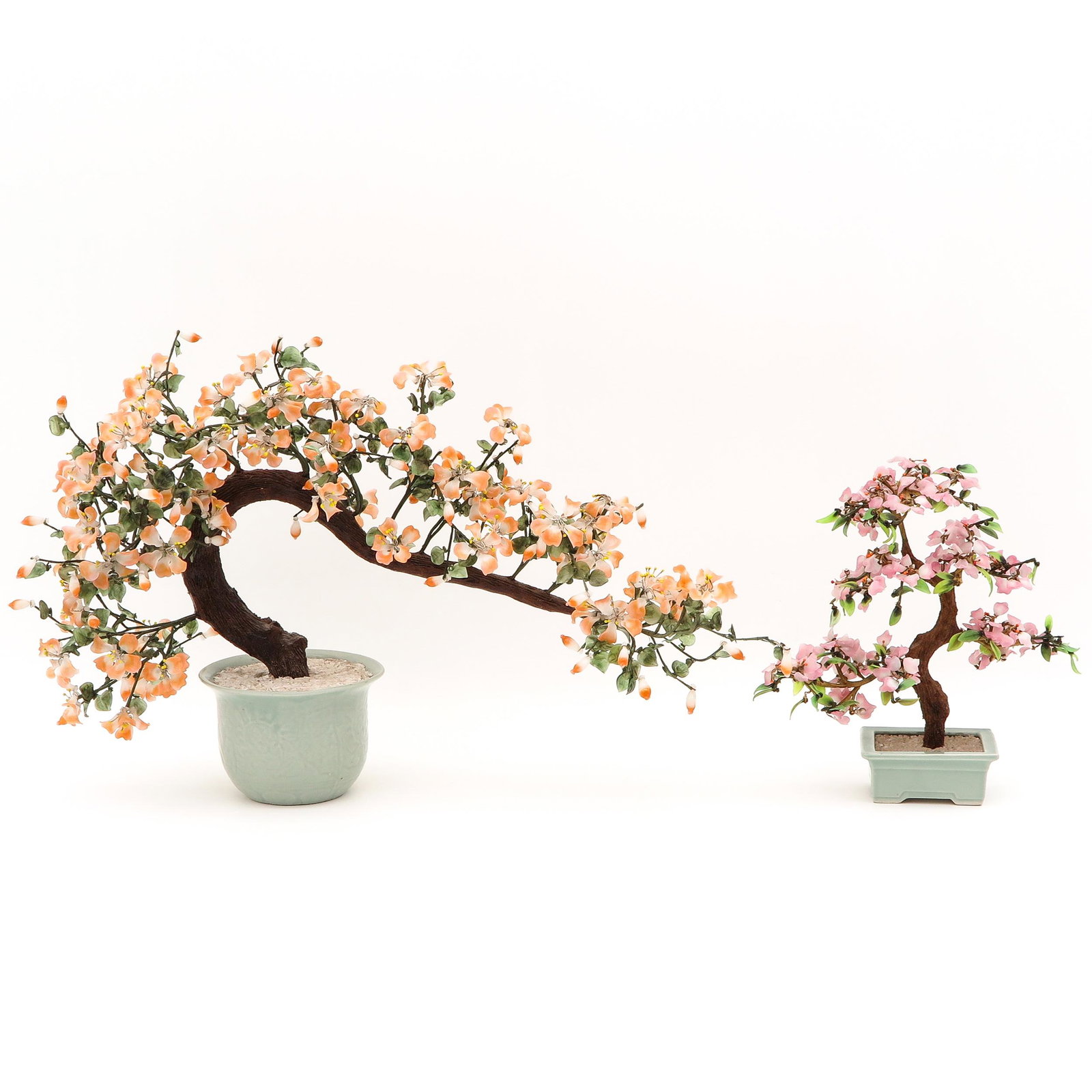 Two Jade Floral Sculptures: Including peach and pink blossoms, large scultpure is 48 cm. tall x 60 cm. wide