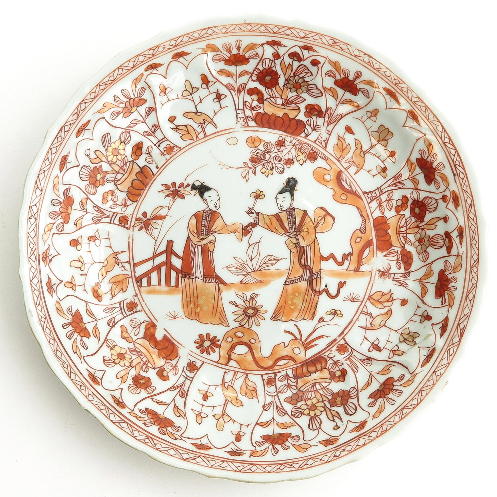 A Milk and Blood Decor Plate: Depicting Chinese figures in garden, 21 cm. in diameter.