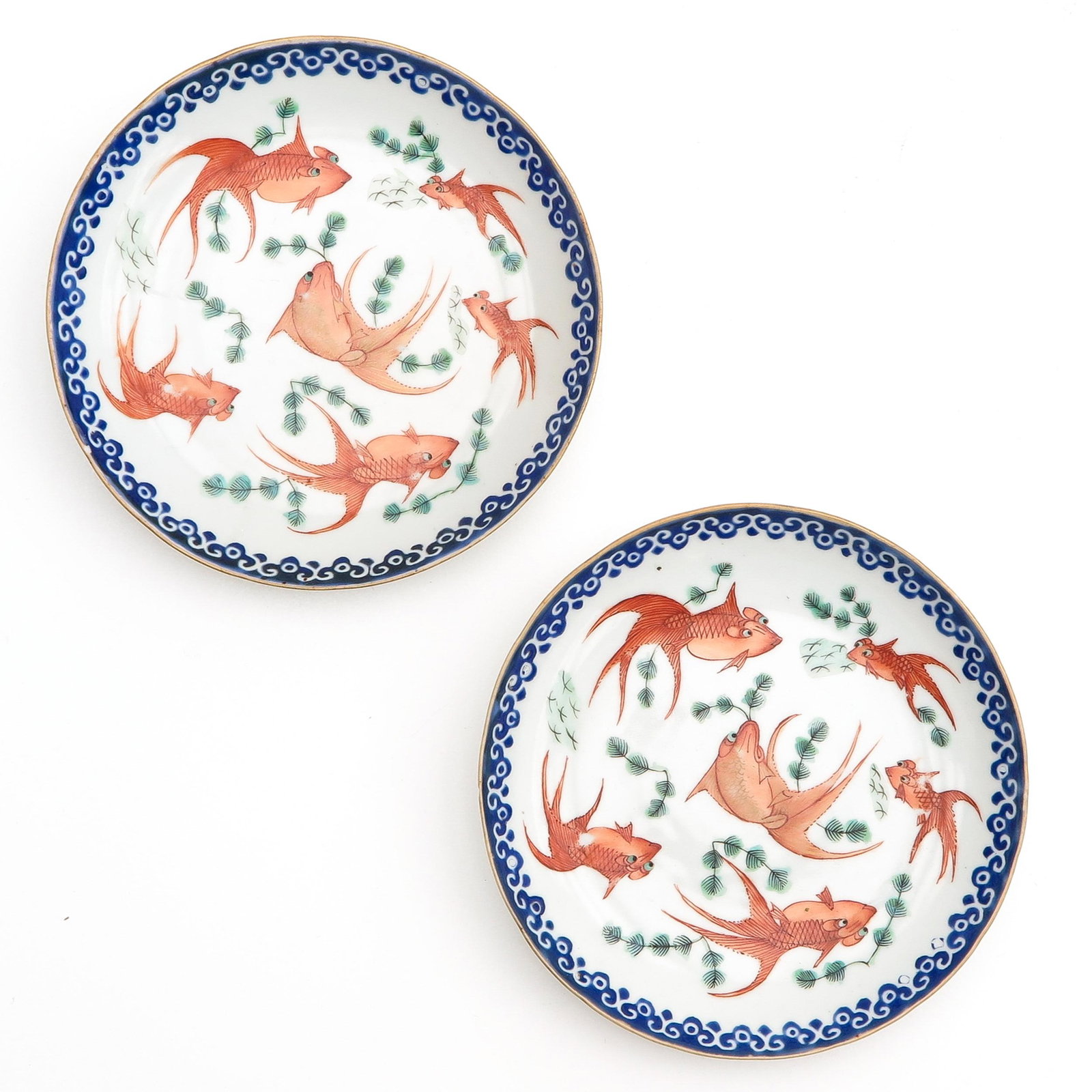 2 Polychrome Plates: Decorated with carp, 17 cm. in diameter, chip.
