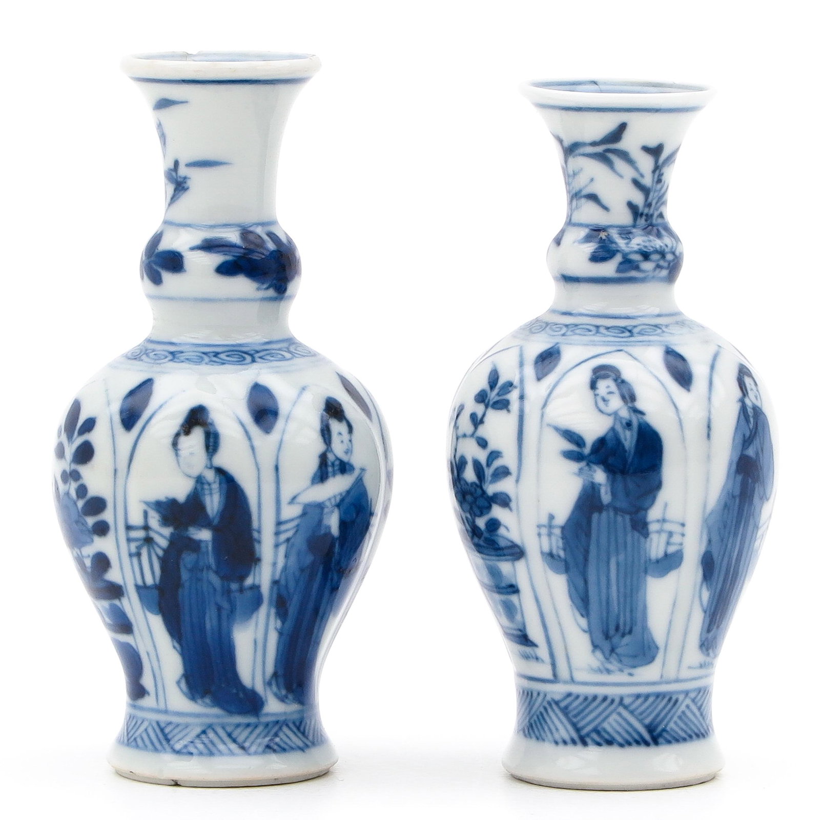 Pair of Miniature Vases: Decorated with Chinese ladies and flowers, 10 cm. tall, chip and hairline.
