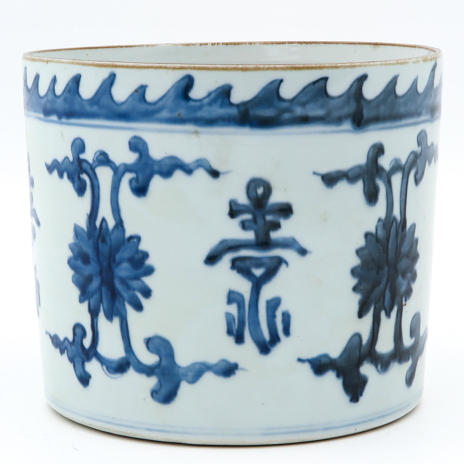 A Blue and White Brush Pot: Decorated with florals and Chinese symbols, 18 cm. tall.