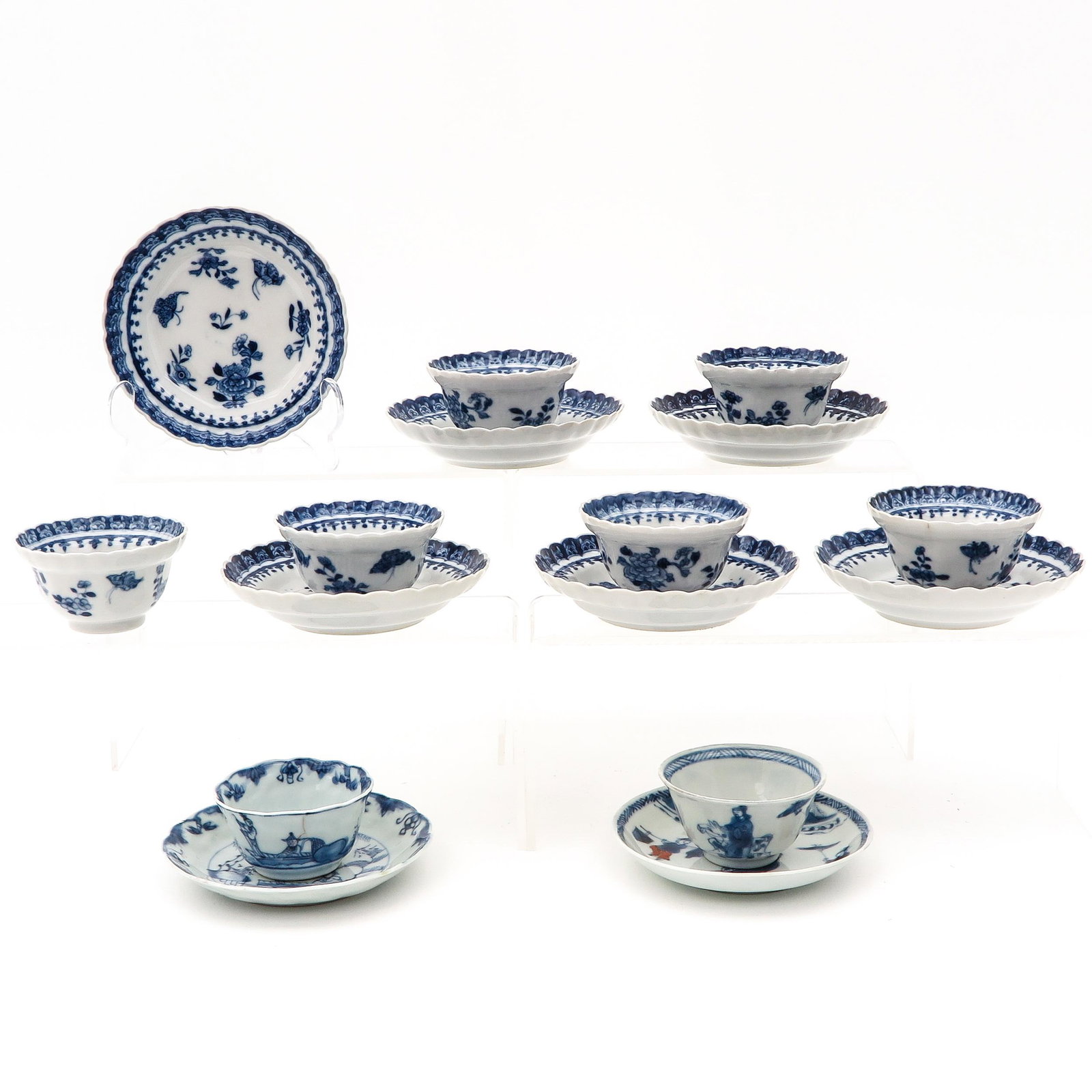 A Collection of Cups and Saucer: In diverse decors, largest saucer is 11 cm. in diameter, 8 cups and saucers, in diverse conditions.