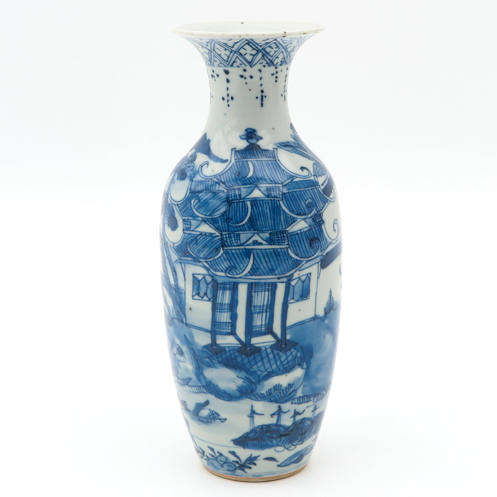 A Blue and White Vase: Decorated with landscapes and Chinese figures, 26 cm. tall.