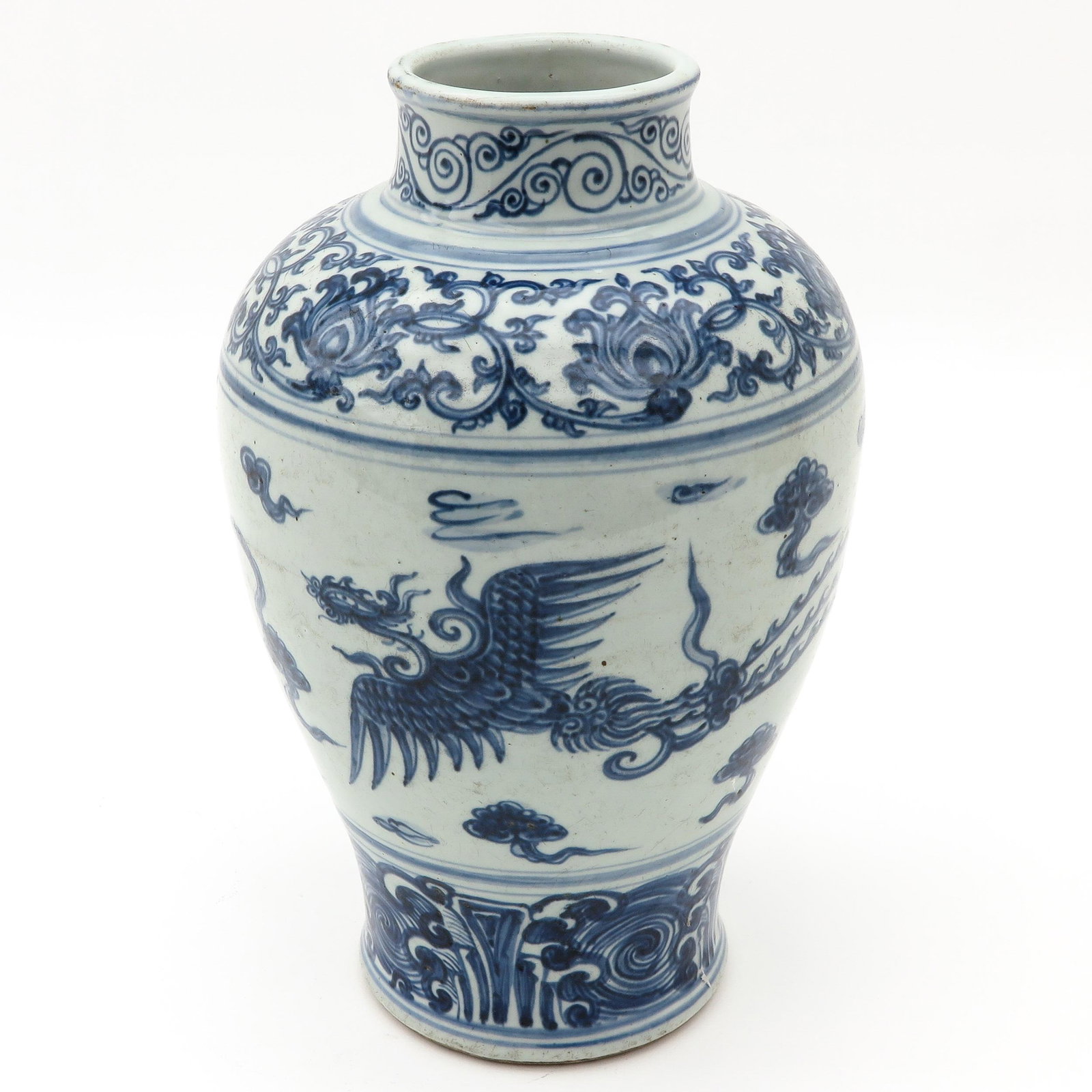 A Blue and White Vase: Decorated with bird of paradise and florals, 35 cm. tall.