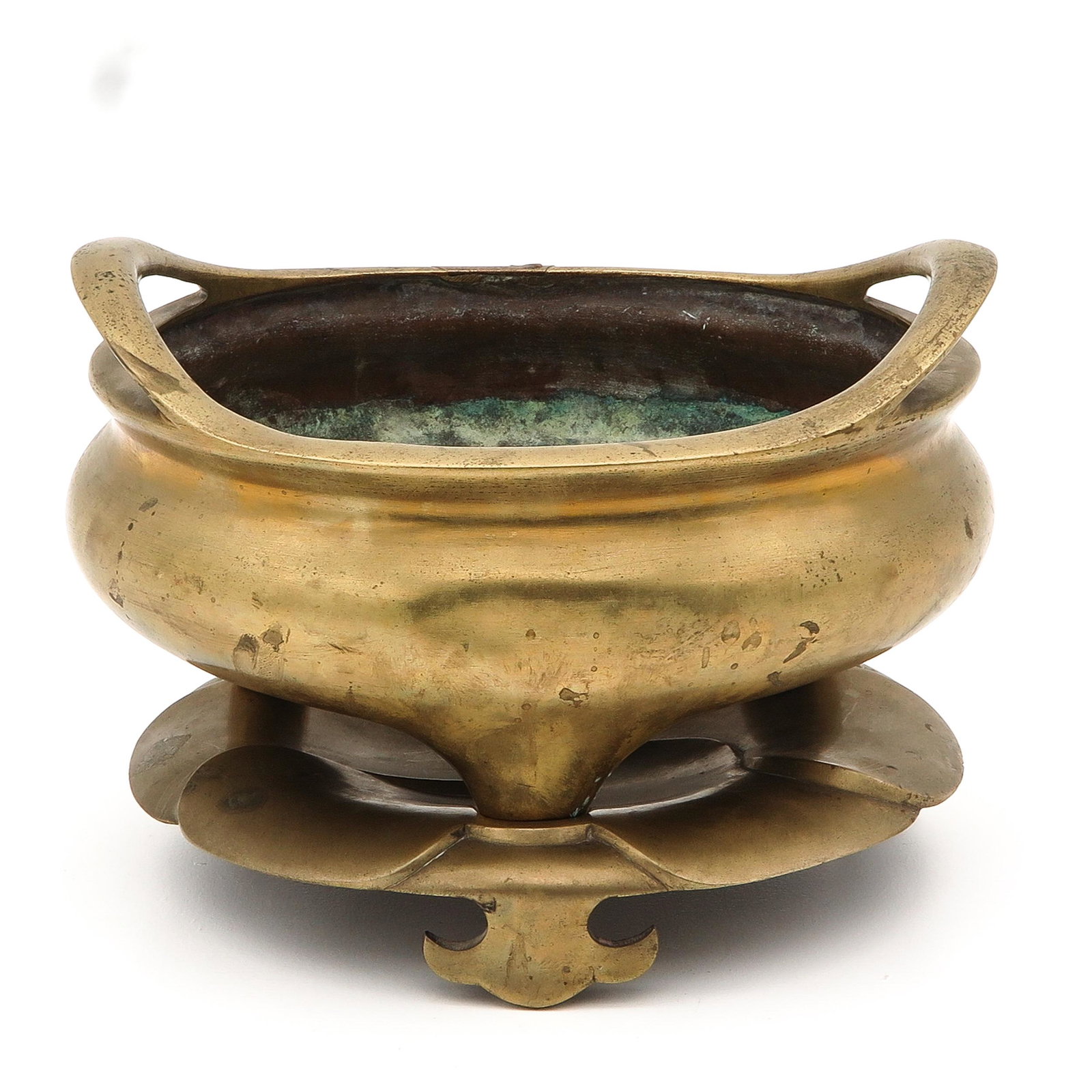 A Bronze Tripod Censer on Base: Tripod censer standing on lotus shaped base with incised seal mark on bottom of censer, 23 cm. in diameter.