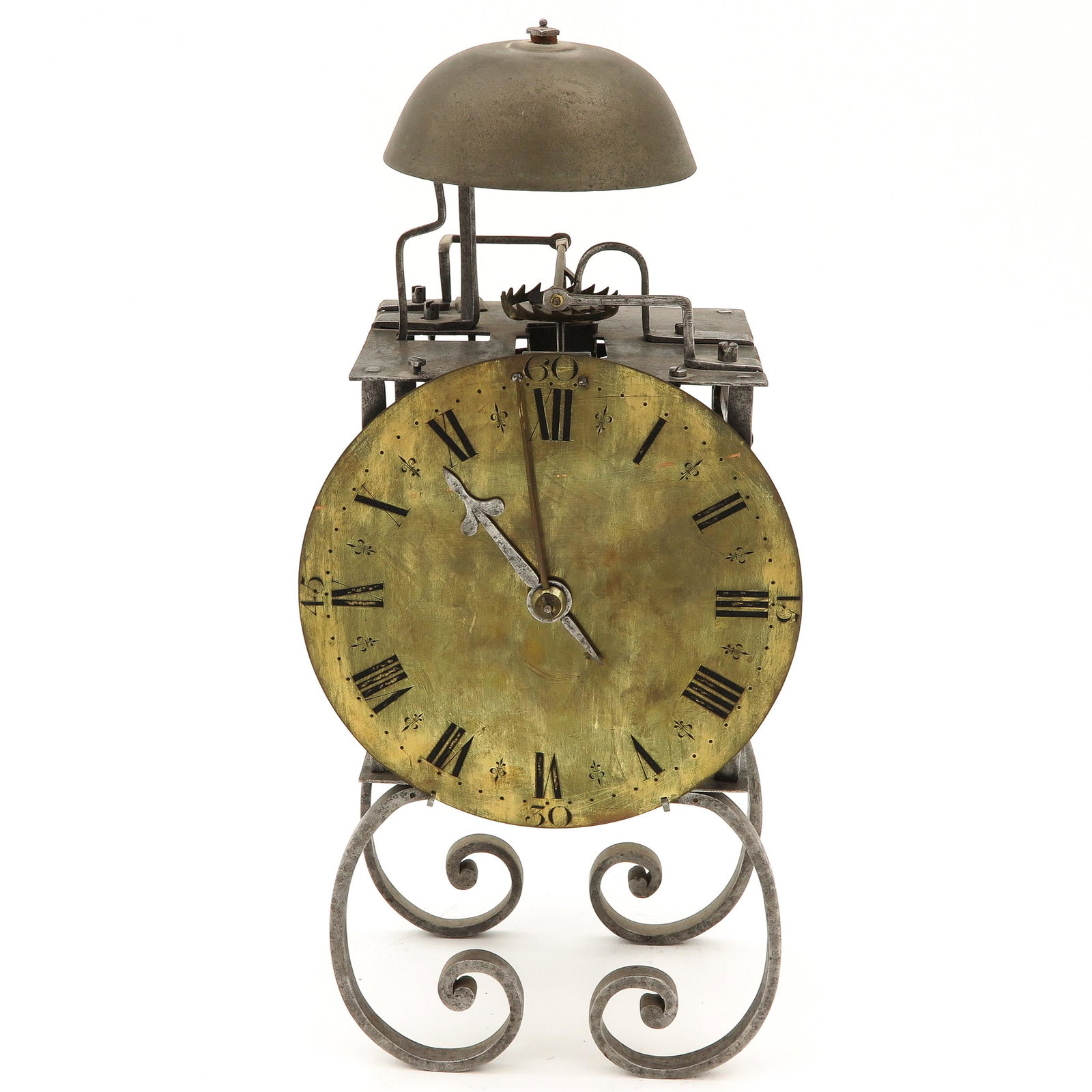 Lantern clock: France, verge escapement and standing on curved spirals, height 45 cm.