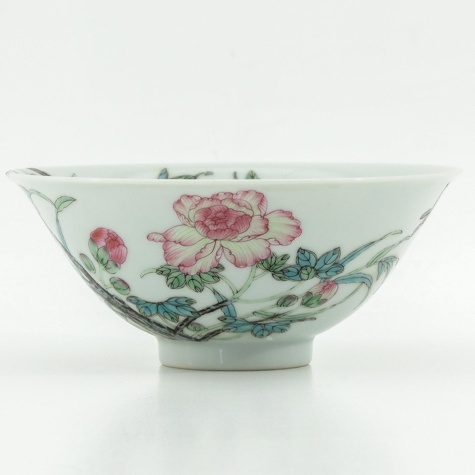 A Famille Rose Bowl: Floral decor, Yongzheng mark, 14 cm. in diameter.