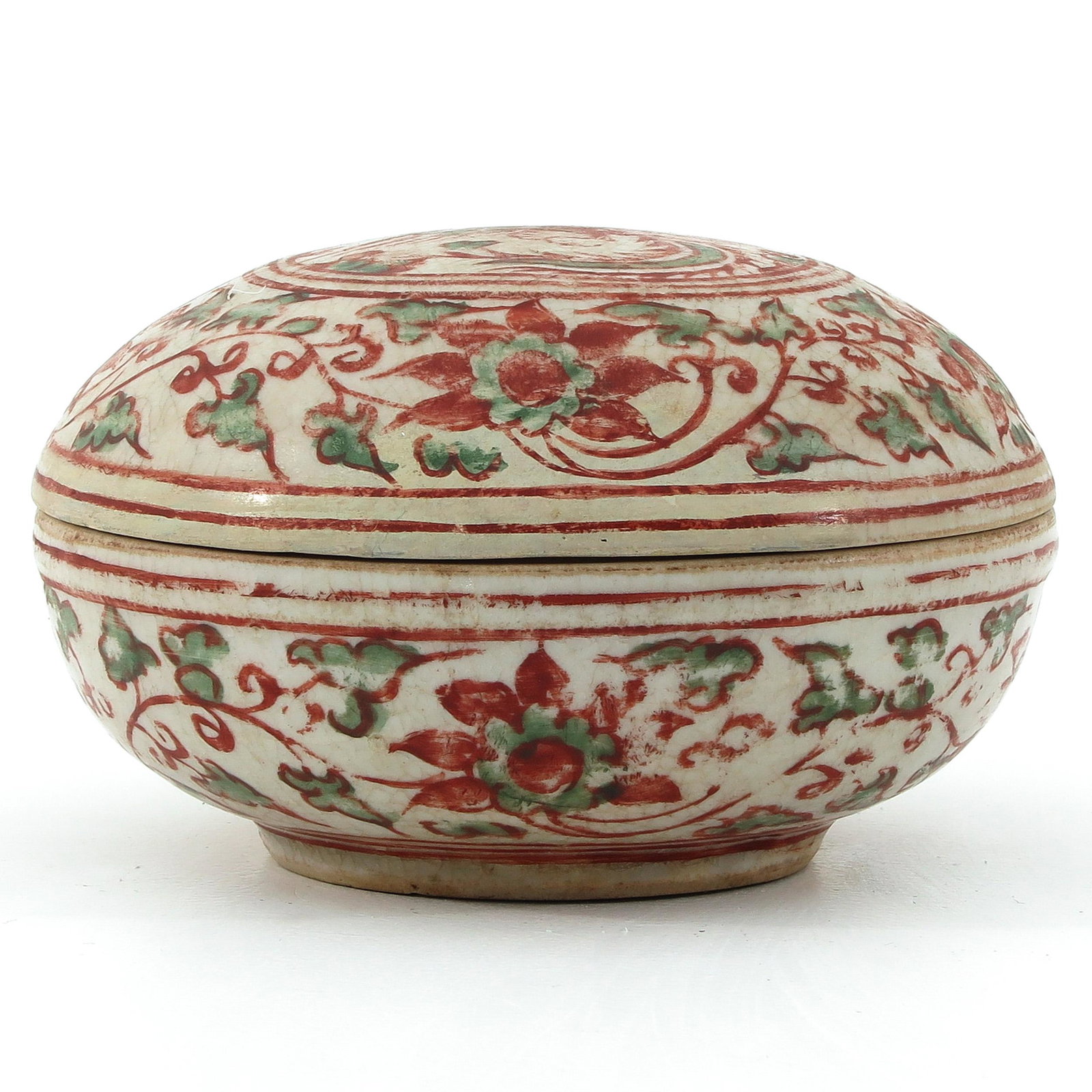 A Swatow Round Box and Cover: Floral decor in orange and green, 10 cm. in diameter x 7 cm. tall.
