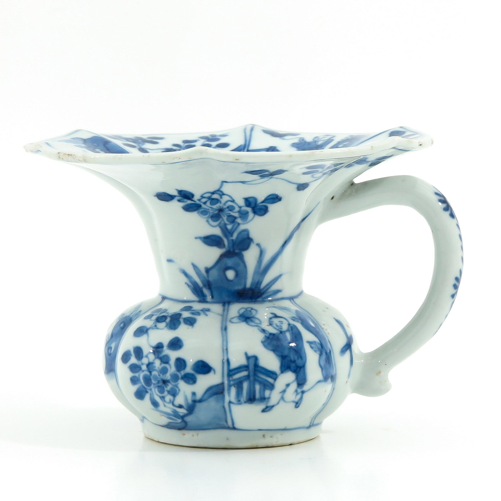 A Blue and White Spittoon: Decorated with flowers and Chinese figures, 10 cm. tall.