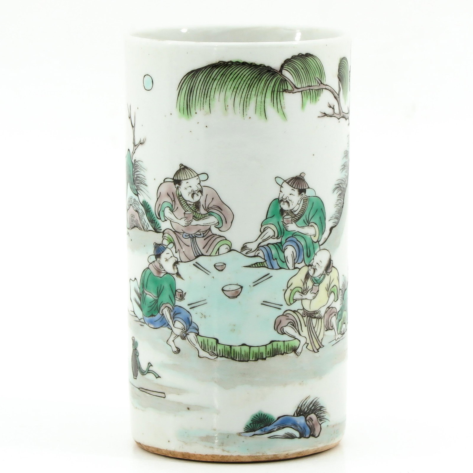 A Famille Verte Brush Pot: Depicting gathering of Chinese figures, 13 cm. tall.