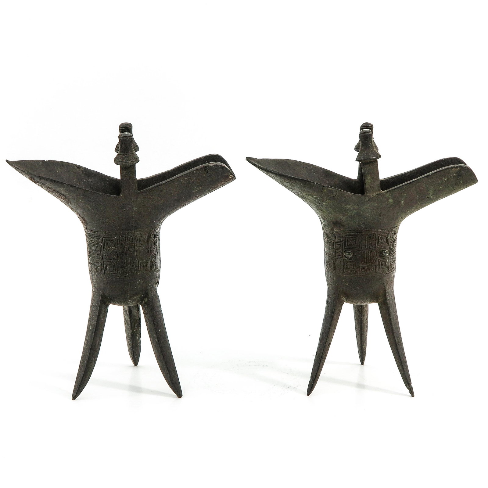 A Pair of Bronze Wine Cups: 21 cm. tall.