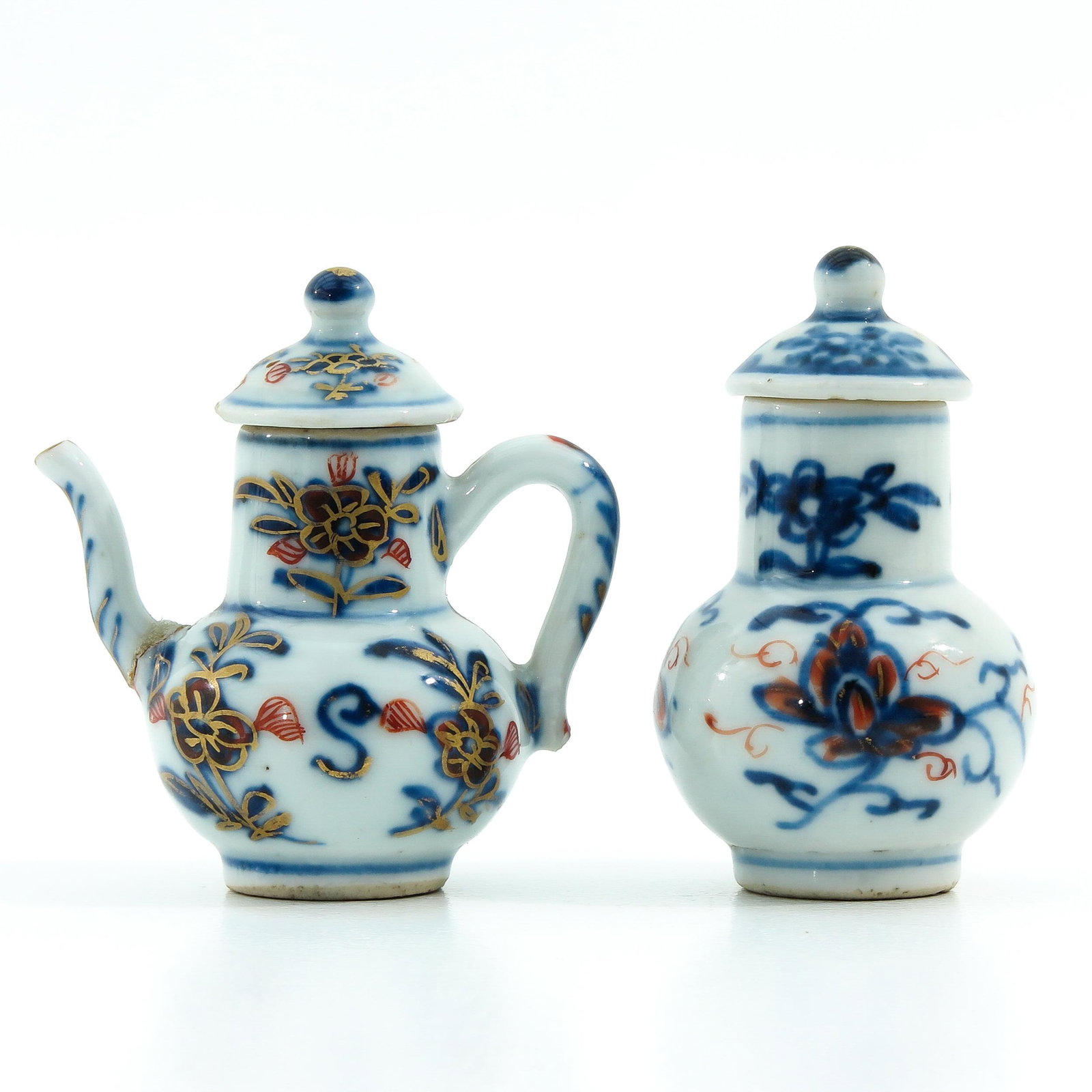 A Miniature Cruet and Vase with Cover: The tallest is 6 cm. tall, restored.