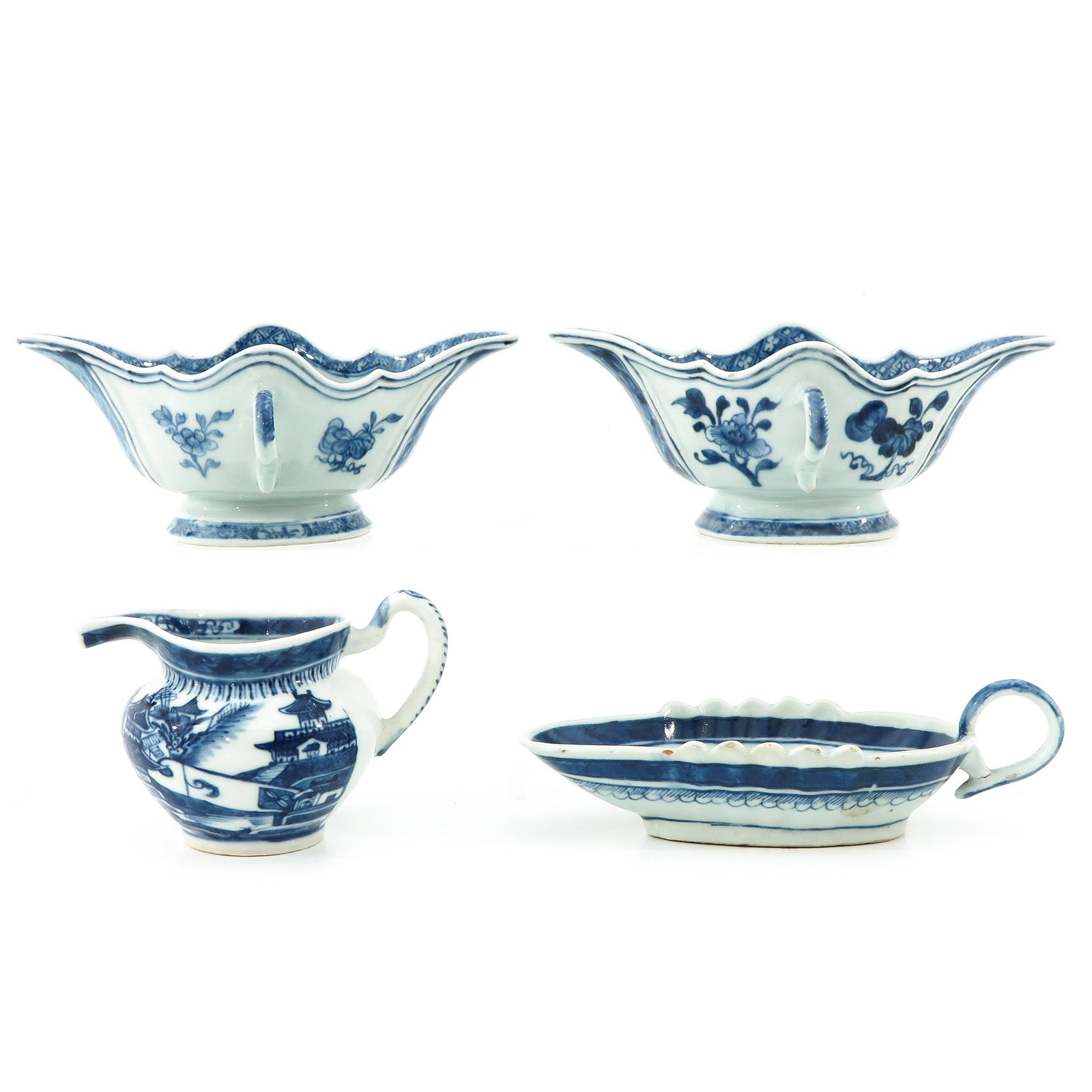 A Collection of Porcelain: Including creamer and 3 gravy boats, circa 1800, longest gravy boat is 20 cm. long.