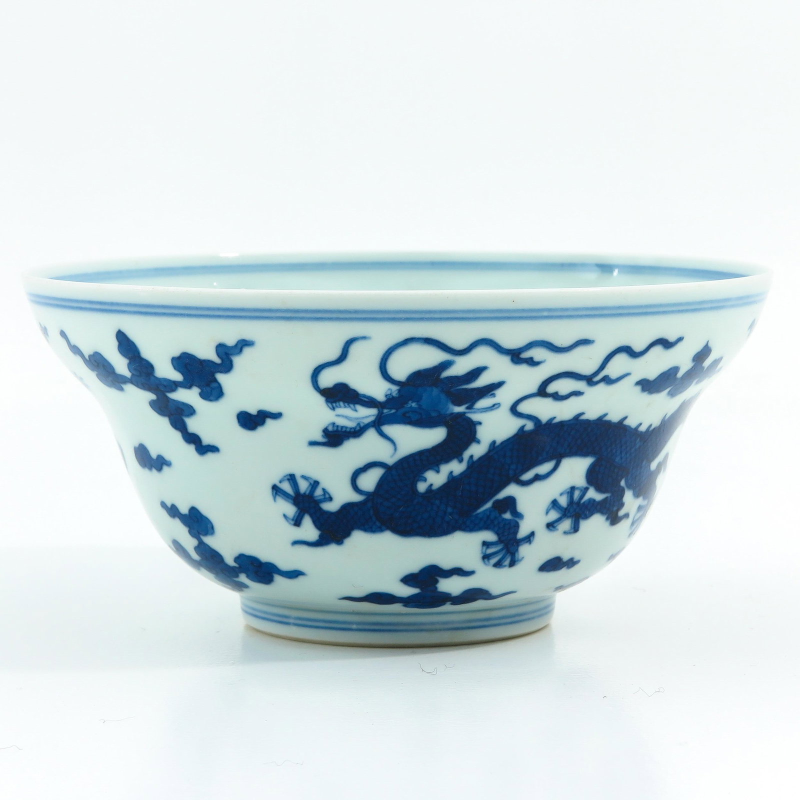 A Blue and White Bowl: Dragon and cloud decor, Daoguang mark, 17 cm. in diameter.