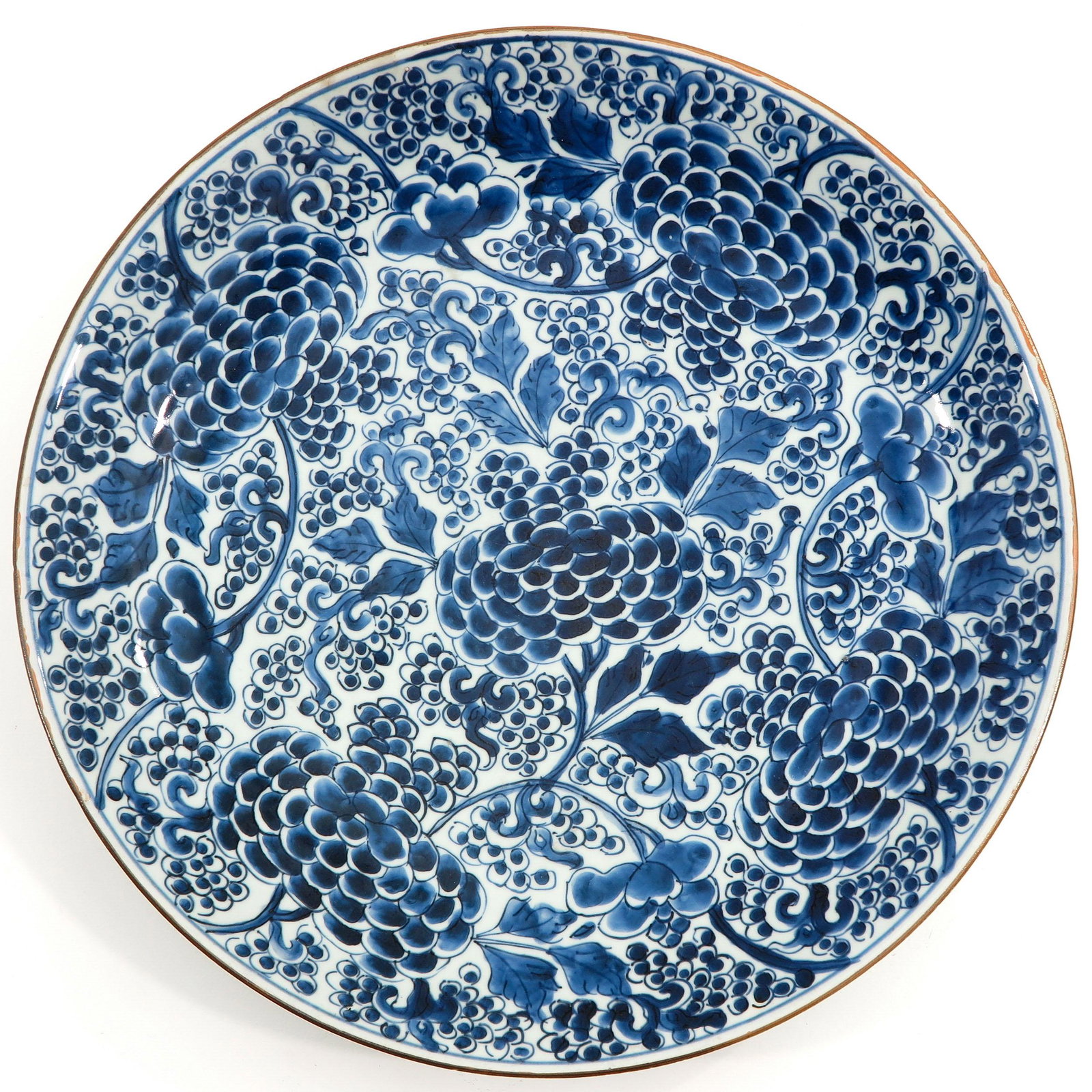 A Blue and White Charger: Floral decor, marked with double ring and sacred fungus, 40 cm. in diameter, chip.