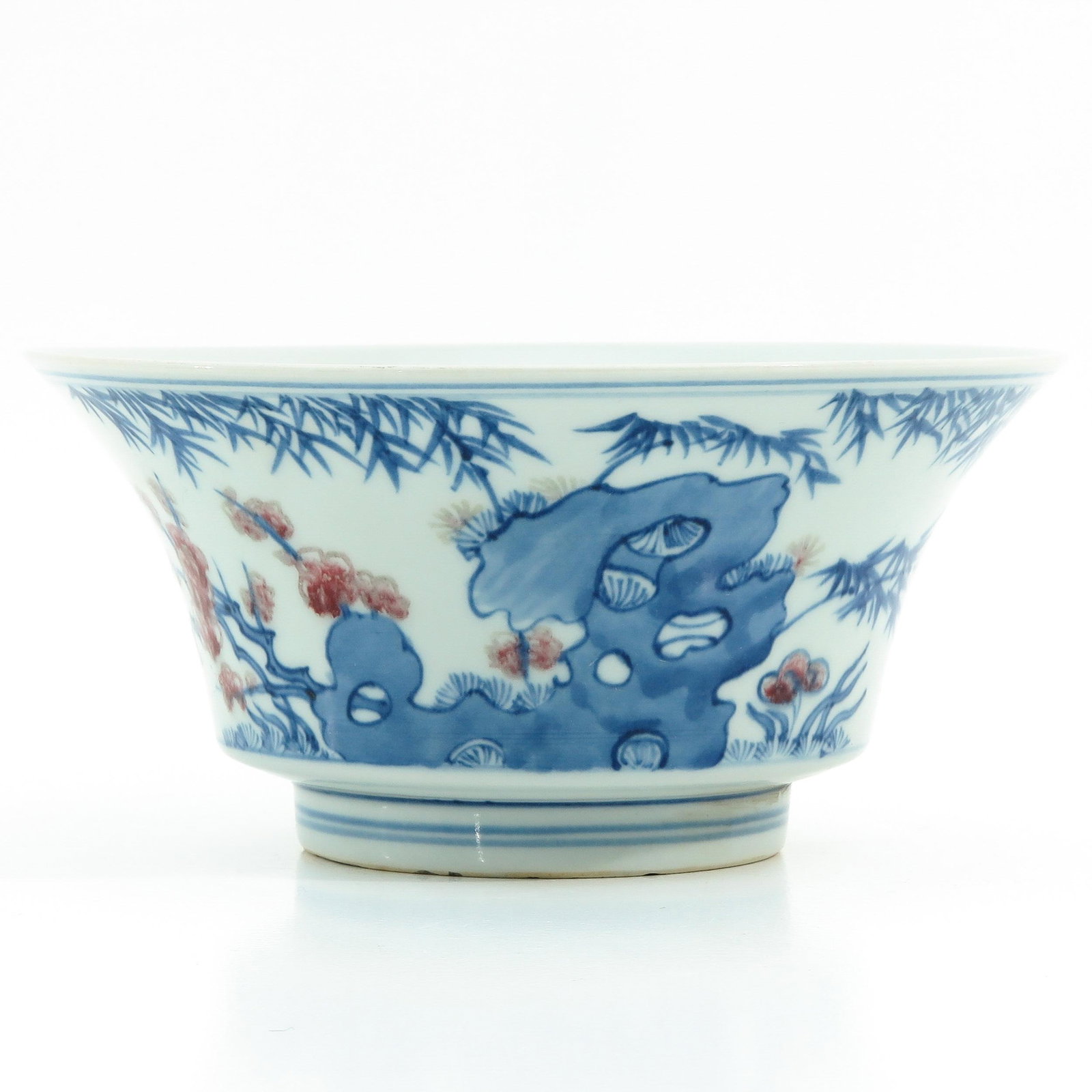 An Iron Red and Blue Decor Bowl: Depicting rocks in bamboo garden, Qianlong mark, 20 cm. tall.