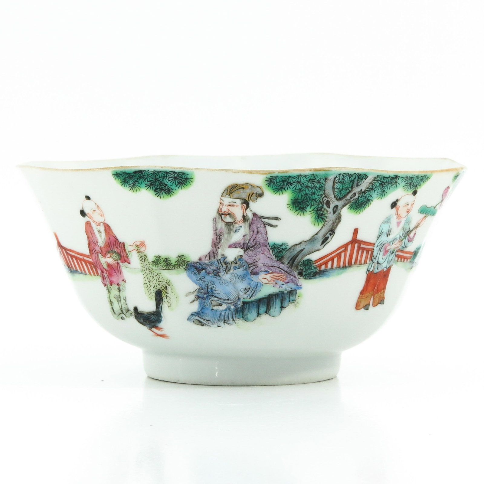A Famille Rose Bowl: Depicting Chinese figures in garden, Daoguang mark, 17 cm. in diameter, hairline.