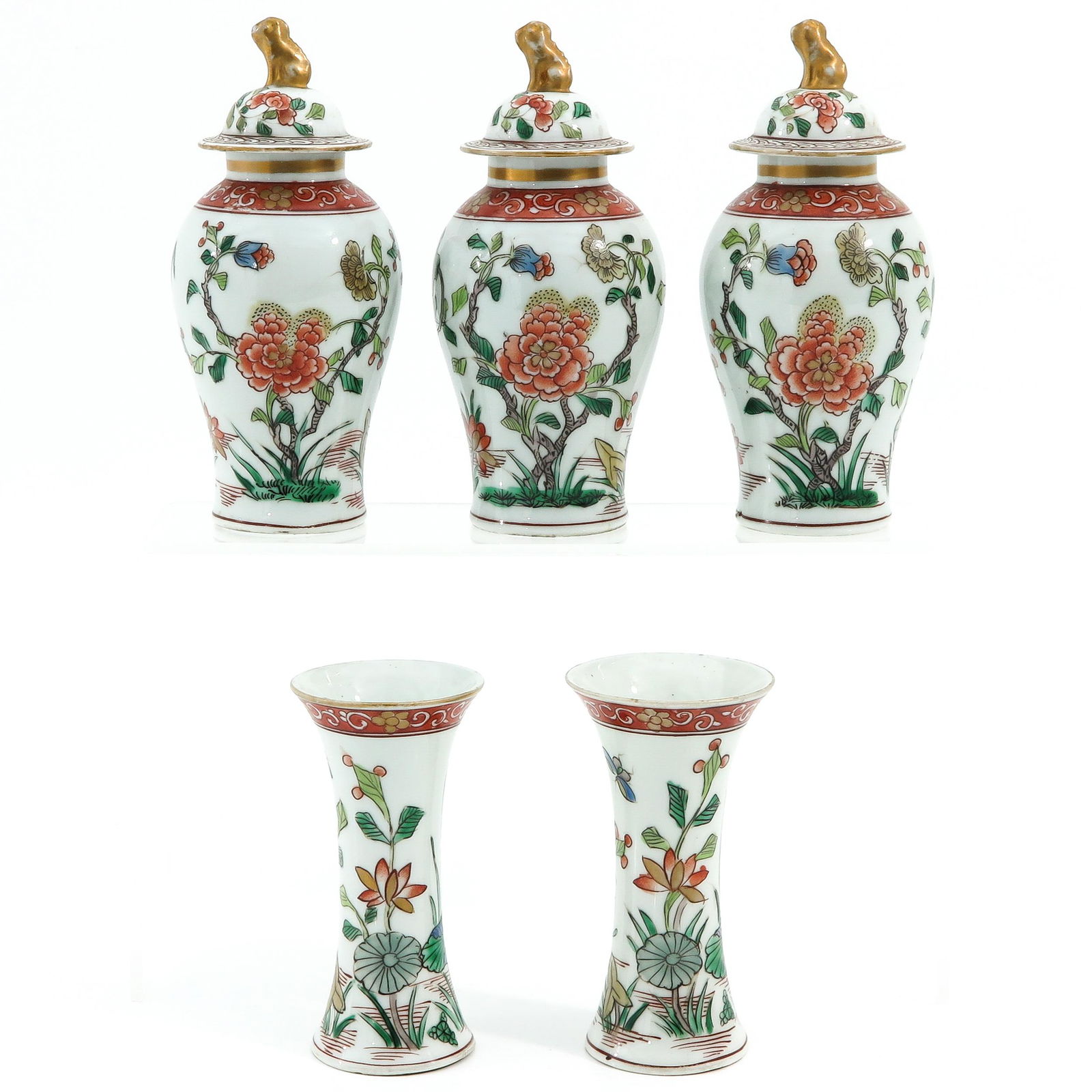 A Set of 5 Garniture Vases: Decorated with lillies in polychrome enamels, 16 cm. tall.