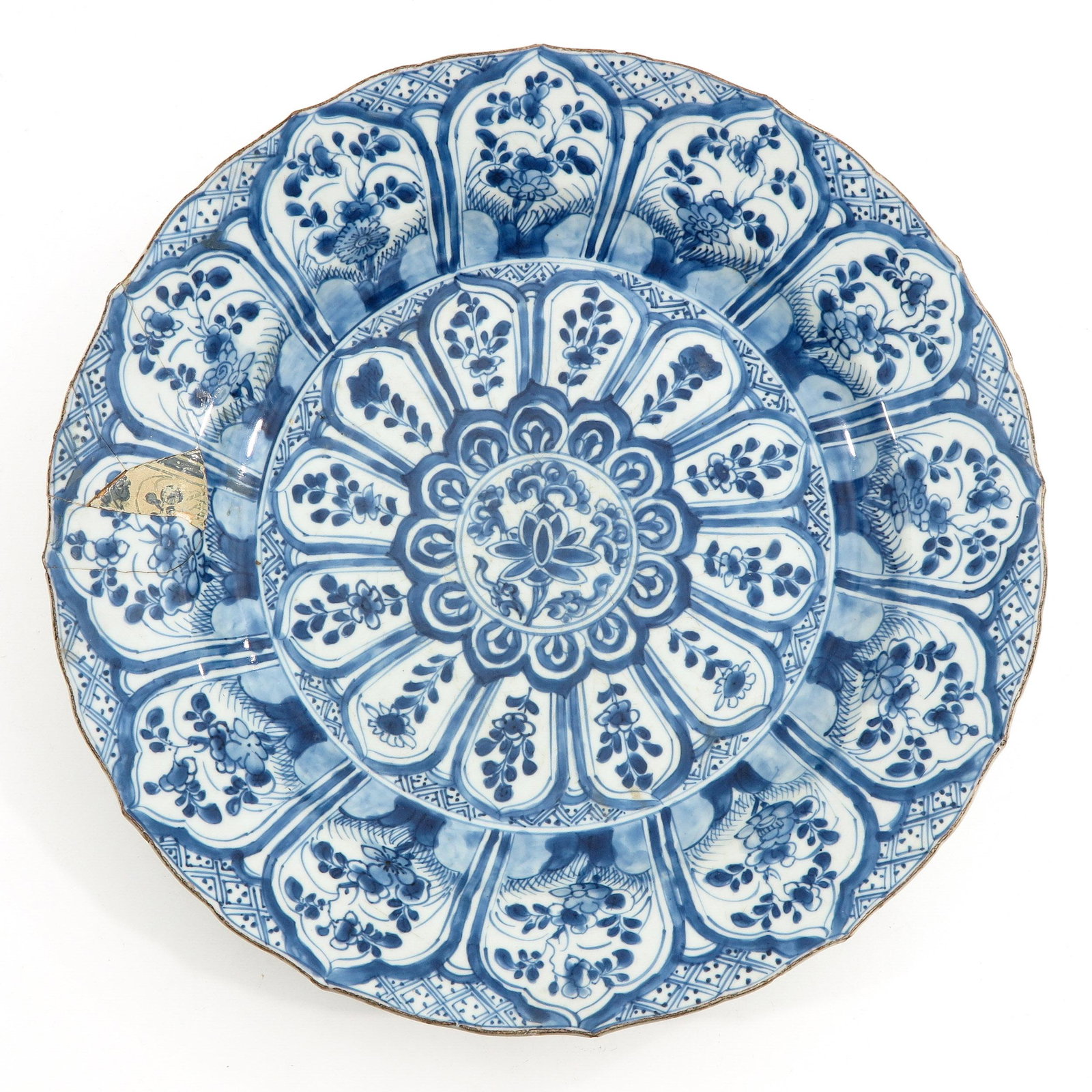 A Blue and White Charger: Floral decor, 38 cm. in diameter, restored.