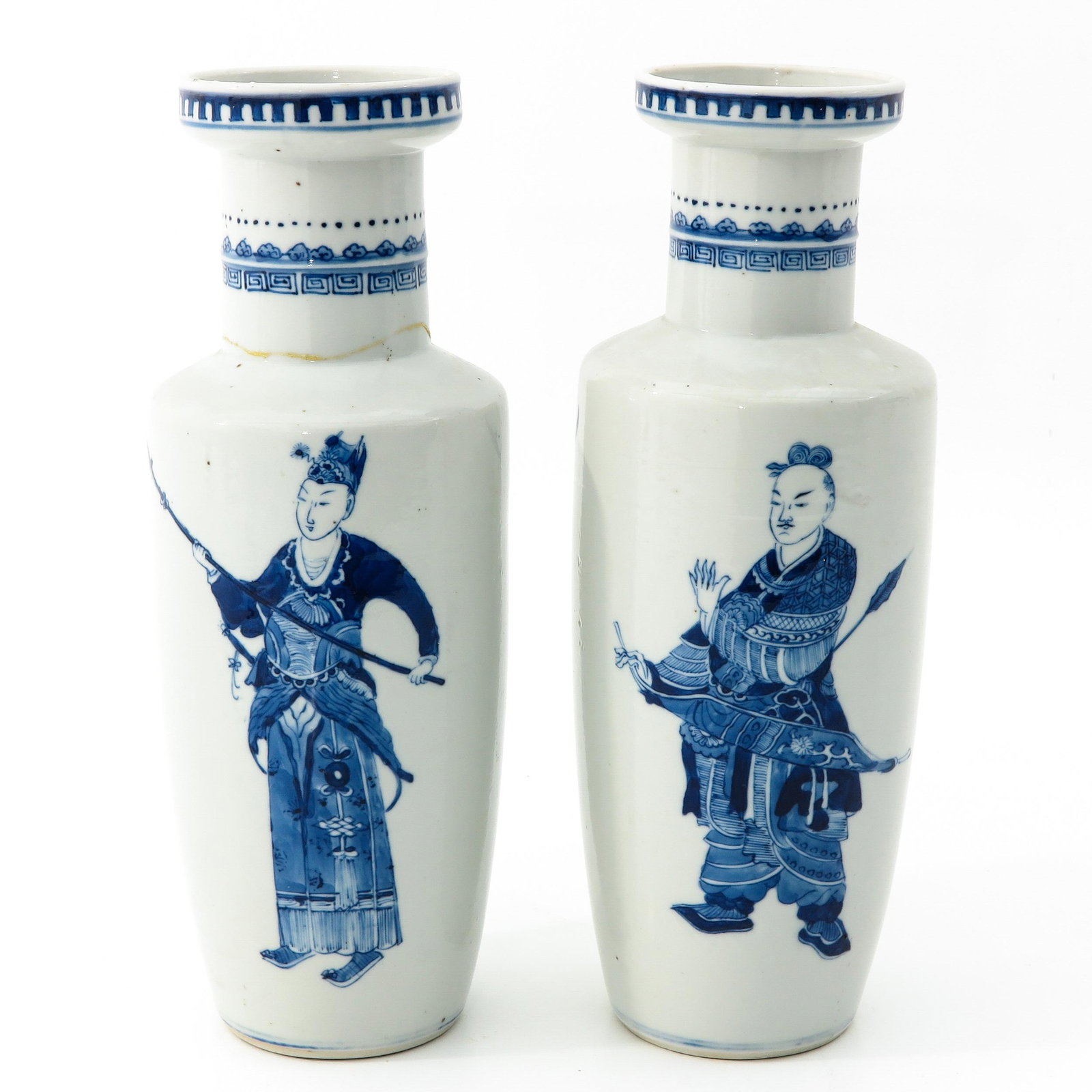 A Pair of Blue and White Vases: Depicting Chinese warriors, 31 cm. tall, 1 vase is restored.