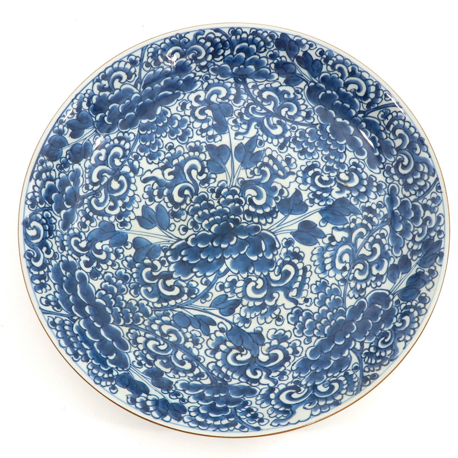 A Blue and White Charger: Floral decor, 18th Century, 38 cm. in diameter.