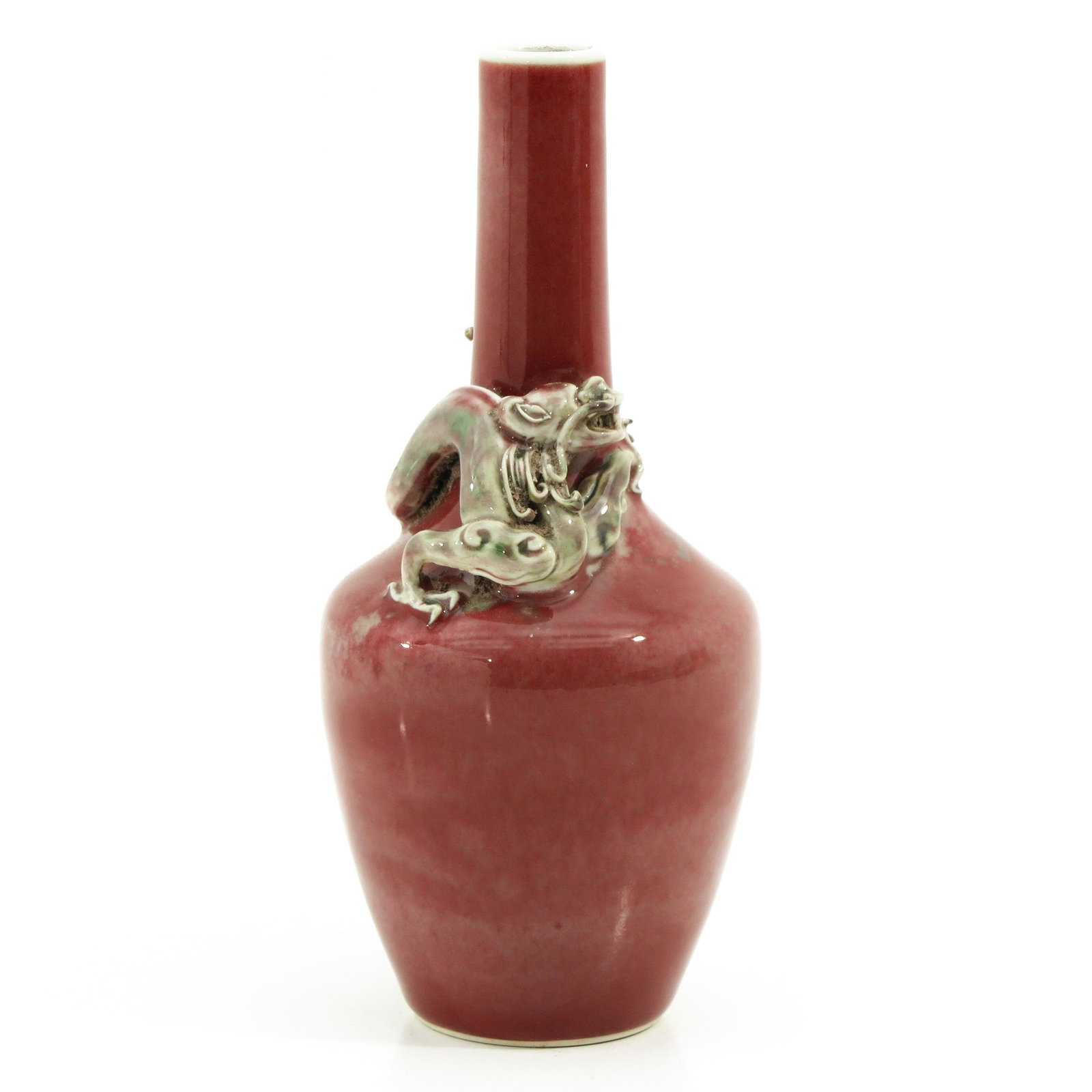 A Purple Glaze Vase: Depicting dragon wrapped around vase, Kangxi mark, 19 cm. tall.