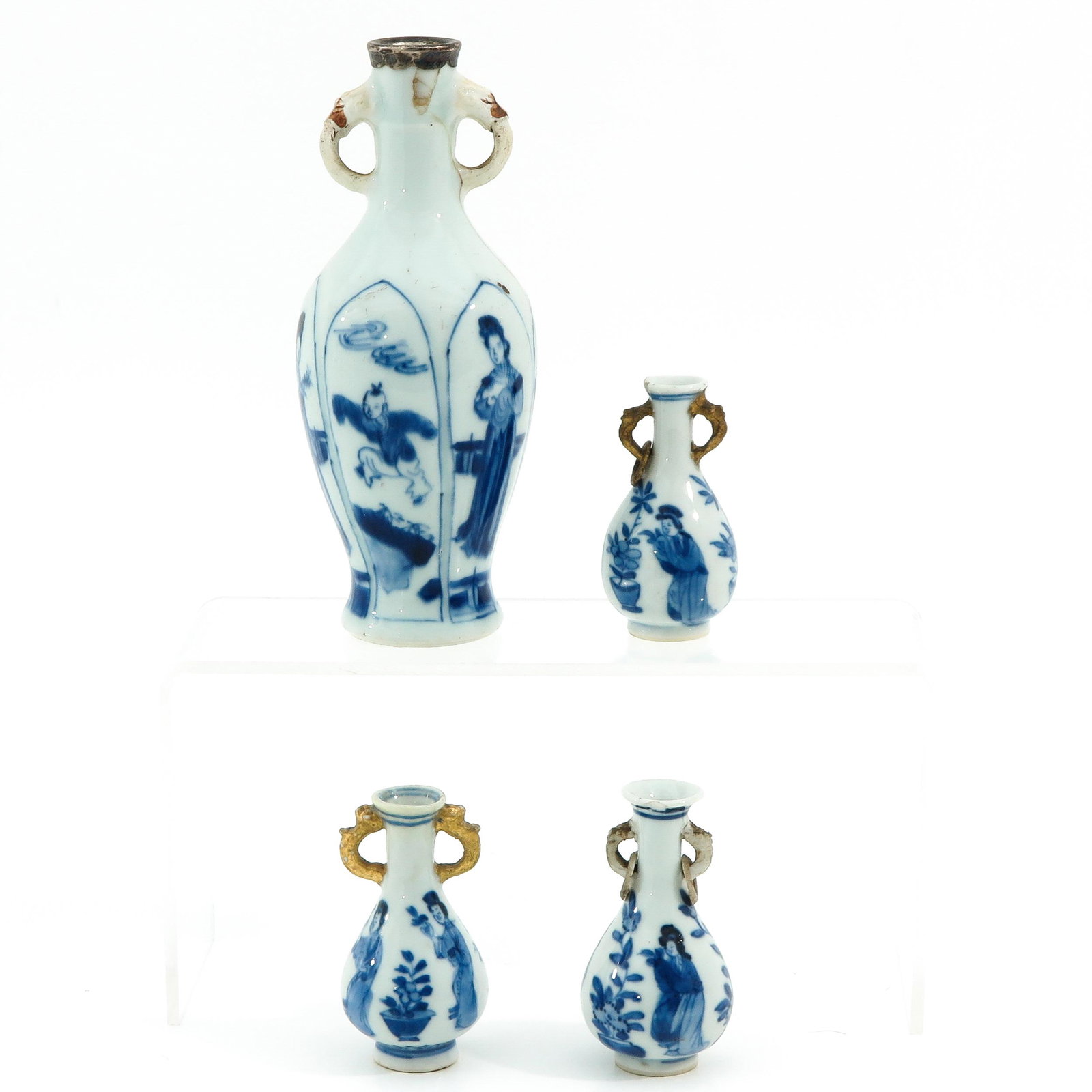 A Collection of 4 Small Vases: Decorated with Chinese figures, Kangxi Period, tallest vase is 15 cm., restored.