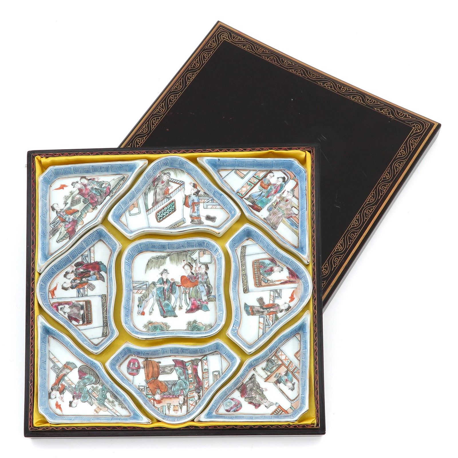 A 9 Piece Hors dâ€™oeuvre Tray: Decorated with Chinese figures, total dimensions of tray is 30 x 30 cm.