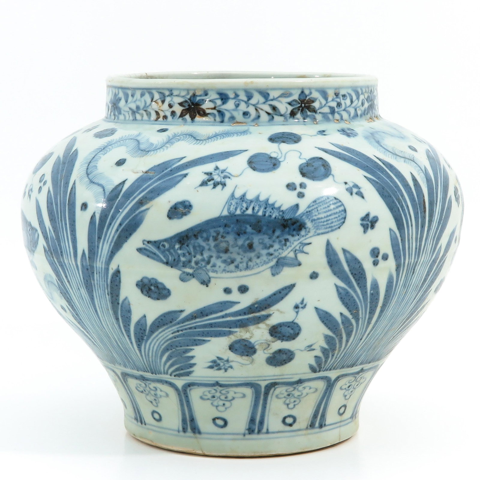 A Blue and White Jar: Depicting fish, restored. 24 cm. tall.