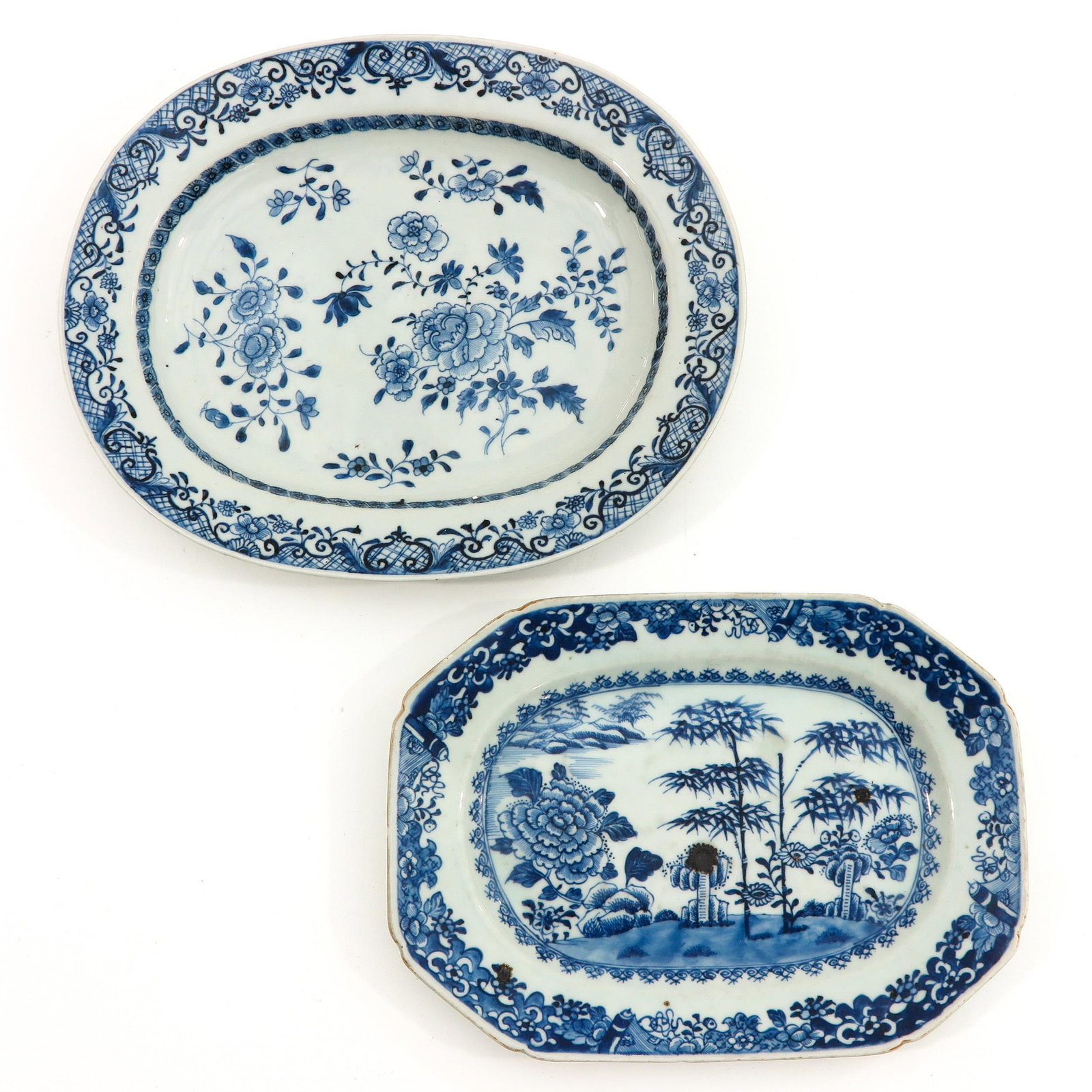 A Lot of 2 Blue and White Trays: Landscape decor, circa 1800, longest tray is 33 cm.