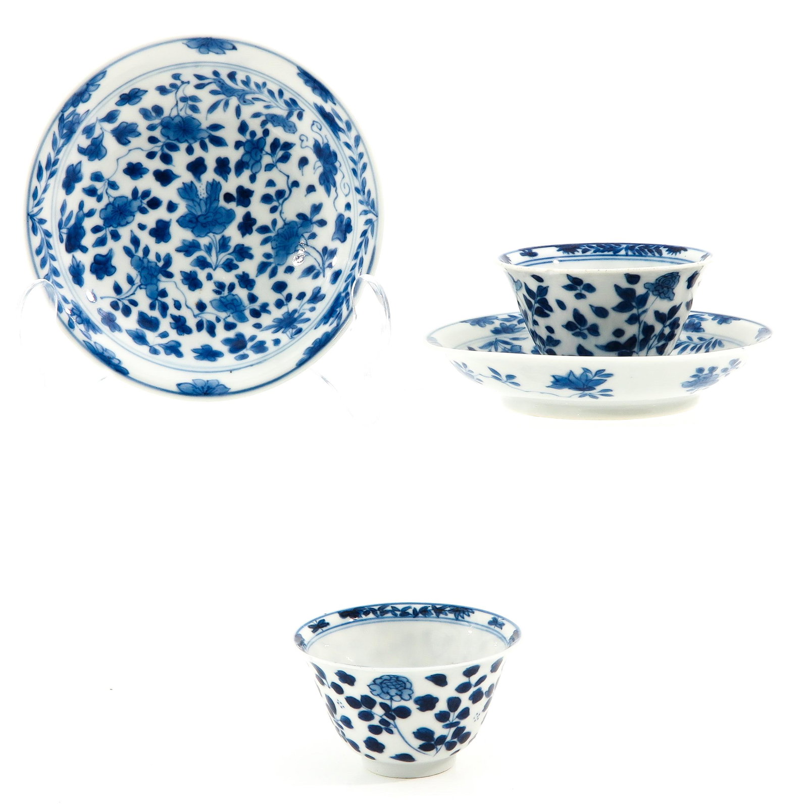 A Lot of 2 Cups and Saucers: Floral decor, saucers are 11 cm. in diameter, chip and hairline.