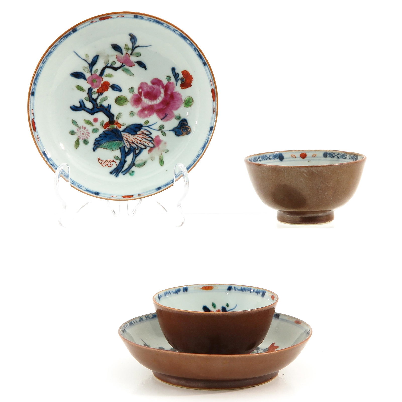 A Pair of Batavianware Cups and Saucers: Famille Rose floral decor, 18th Century, saucers are 13 cm. in diameter.