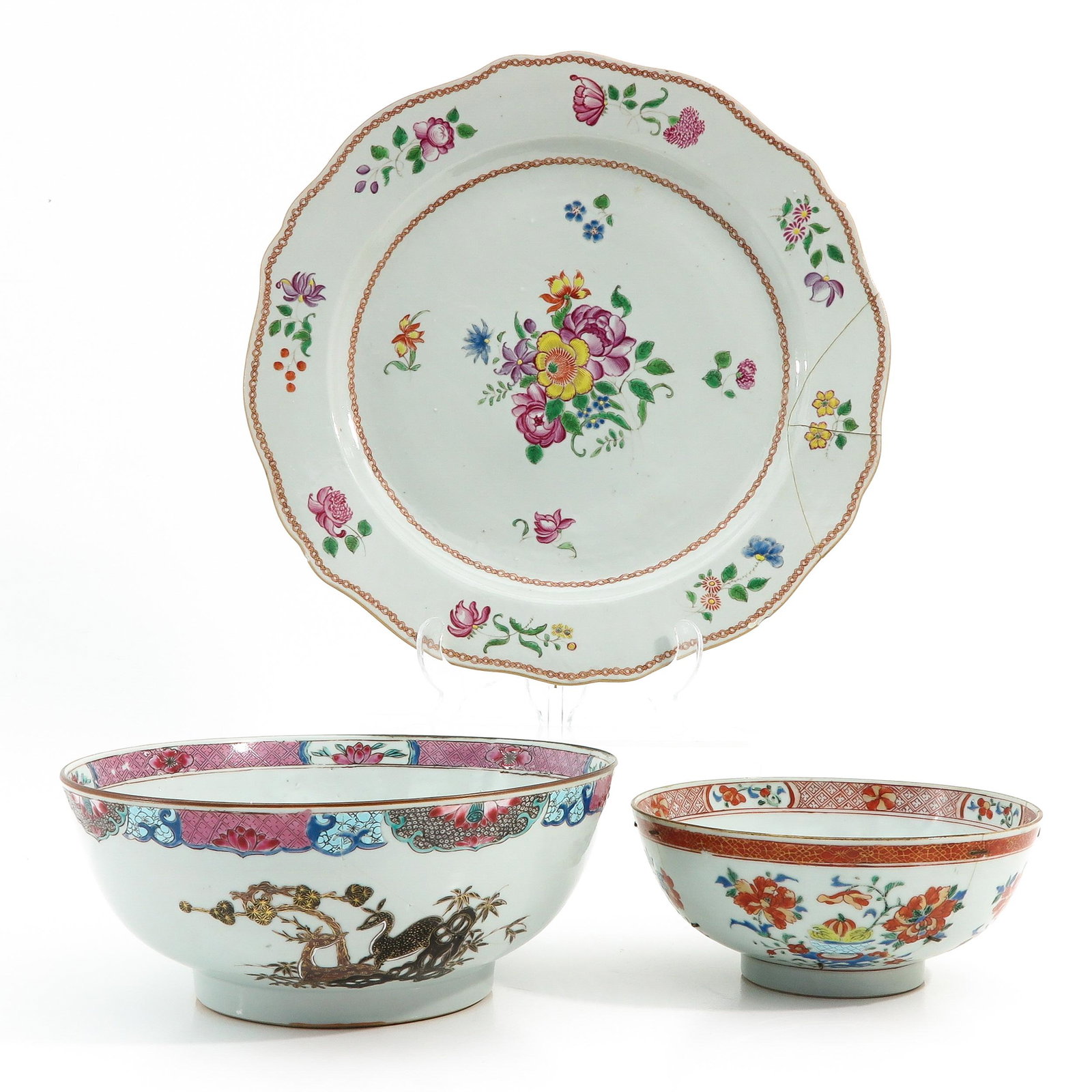 A Collection of Porcelain: Including charger and 2 bowls, 18th Century, 37 cm. in diameter, restored.