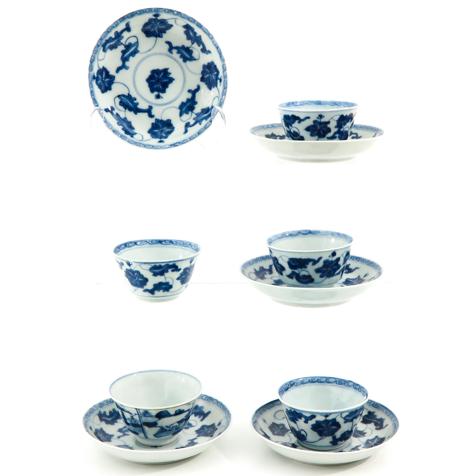A Set of 5 Cups and Saucers: Blue and white floral decor and Chinese figures in garden, saucers are 12 cm. in diameter, chip.