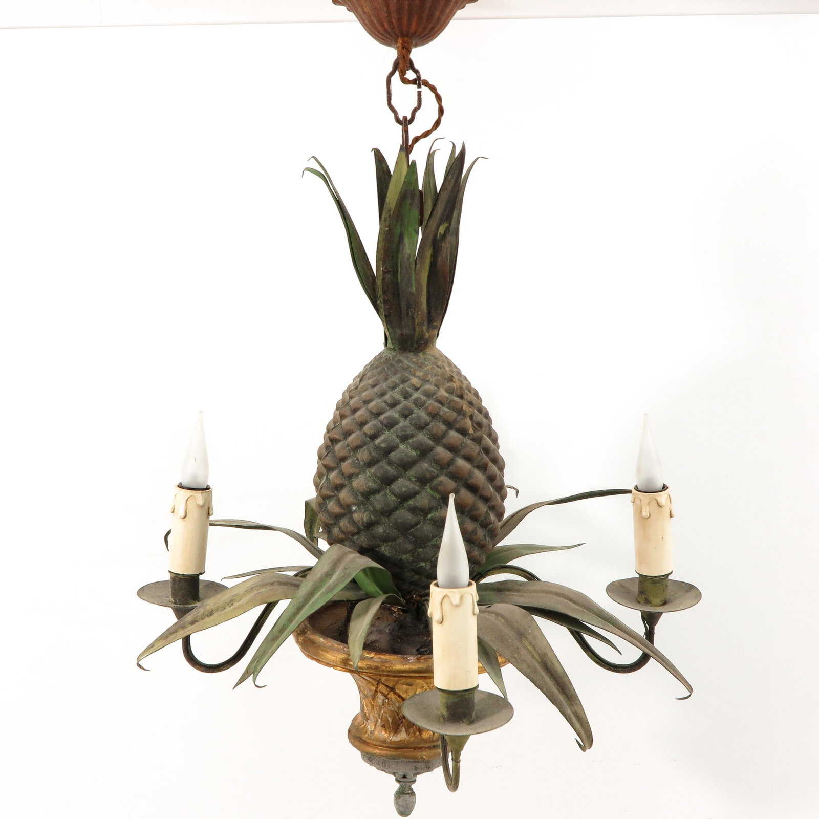 A Carved Wood and Metal Chandelier: In the form of a pineapple, 60 cm. tall.