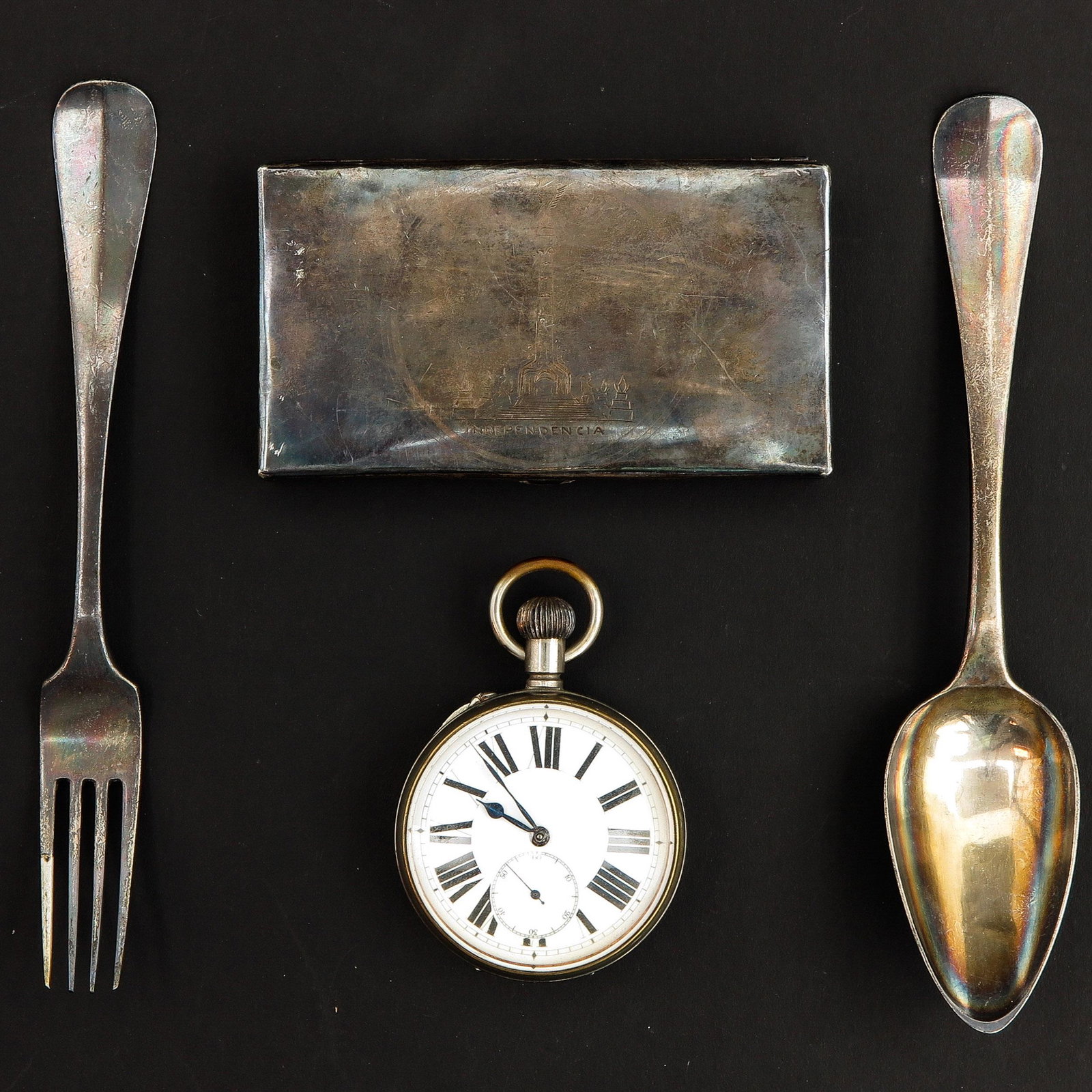 A Diverse Lot: Including a pocket watch 65 mm. in diameter and 2 silver cutlery items and sterling silver box.