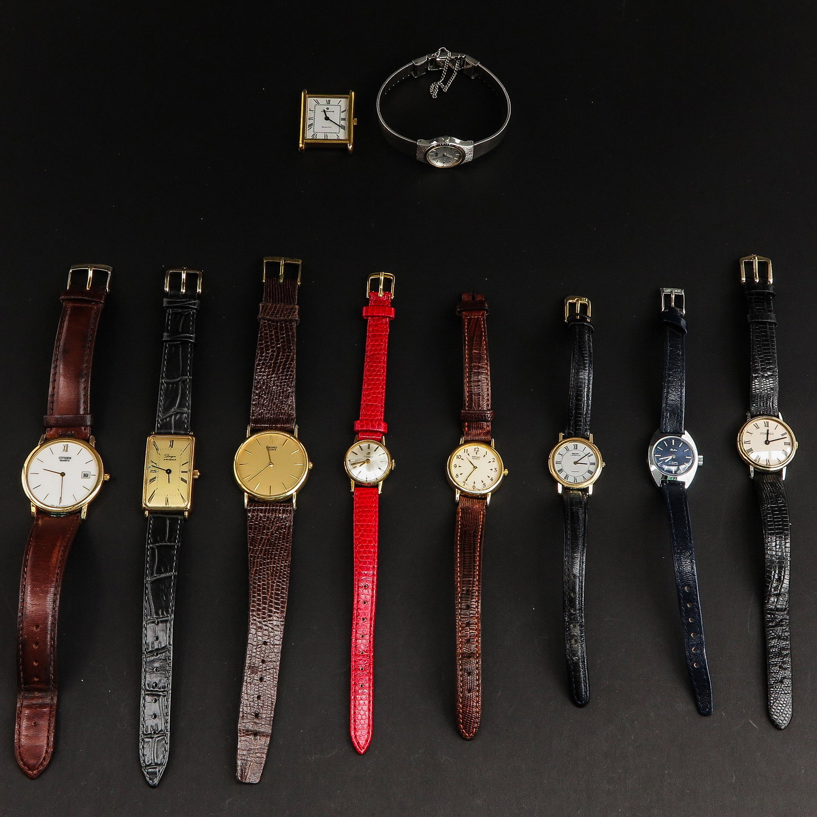 A Diverse Collection of Watches: Including Hermes.