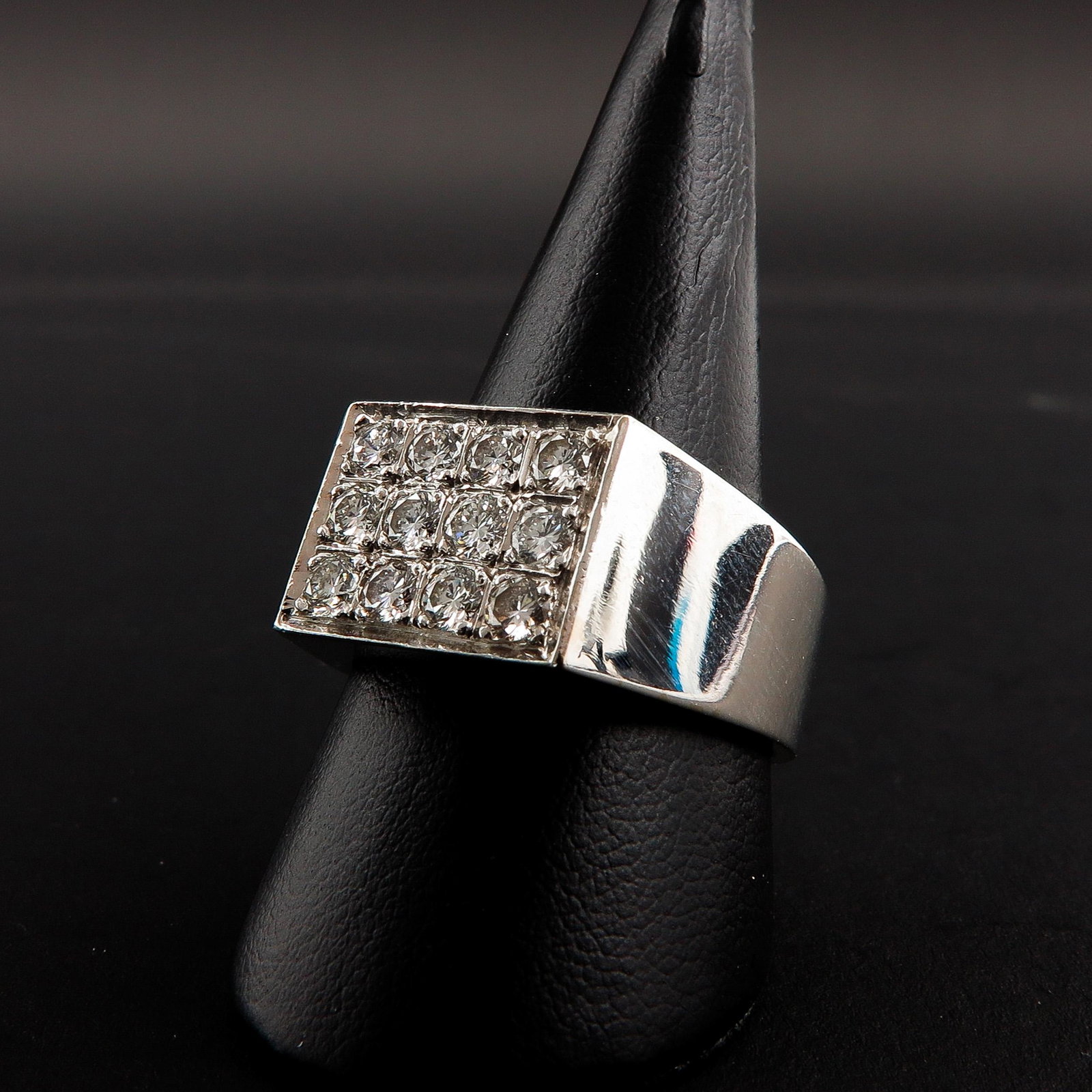 A Mens 14KG Ring: Set with 12 diamonds, circa 1 carat total weight, ring size 21.