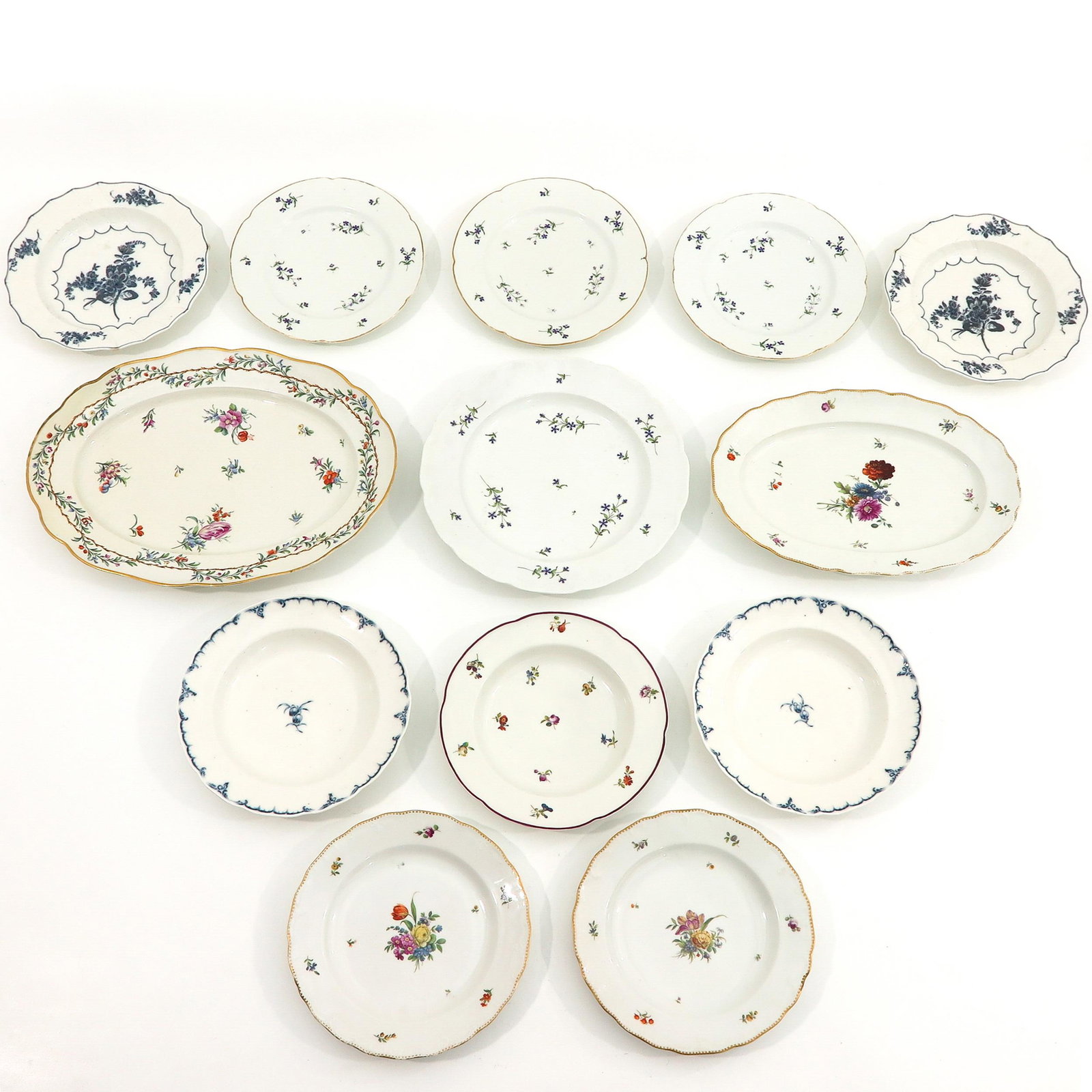 A Collection of 18th Century MOL and Amstel: 13 pieces, longest dish is 44 cm.