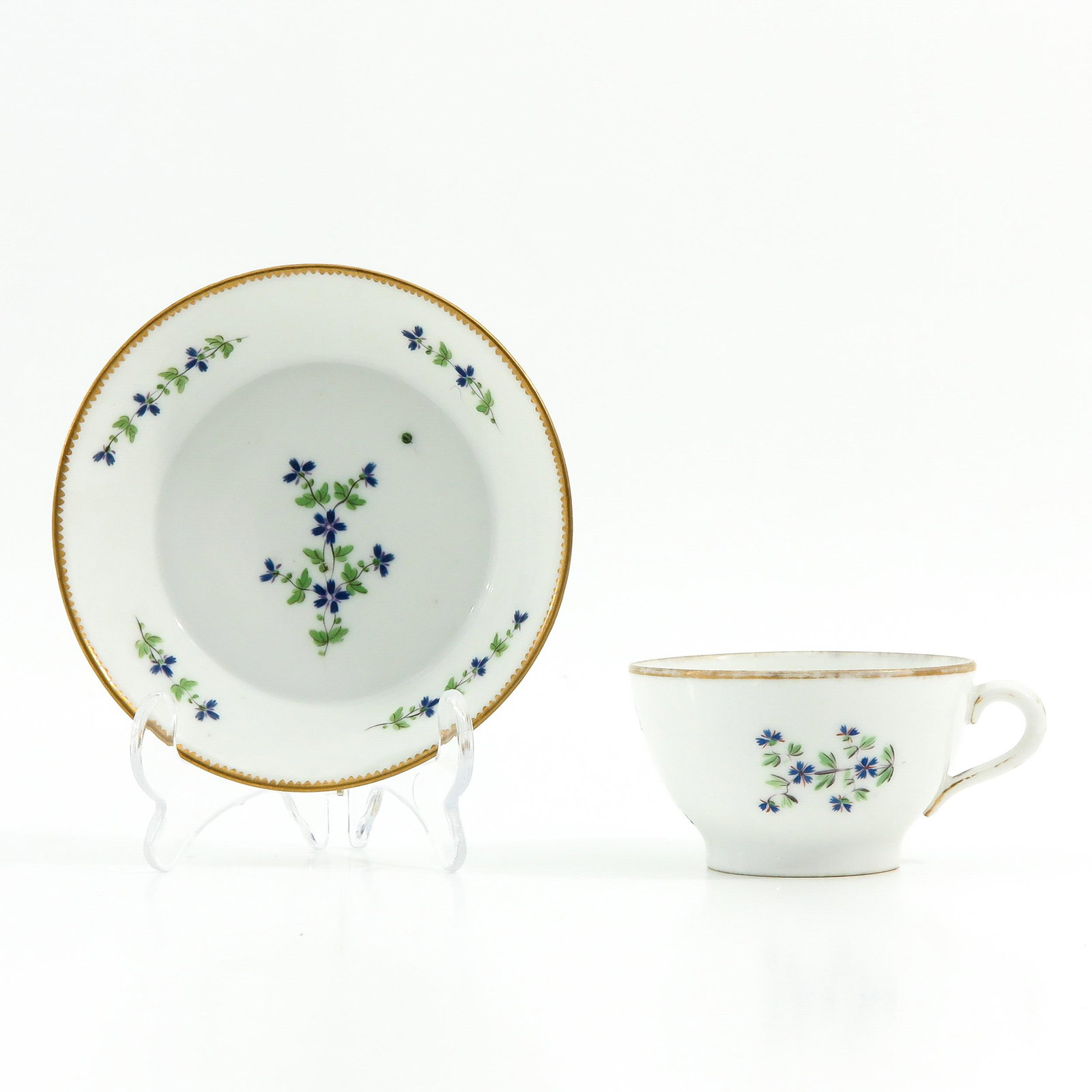 A French Cup and Saucer: Saucer is 13 cm. in diameter.