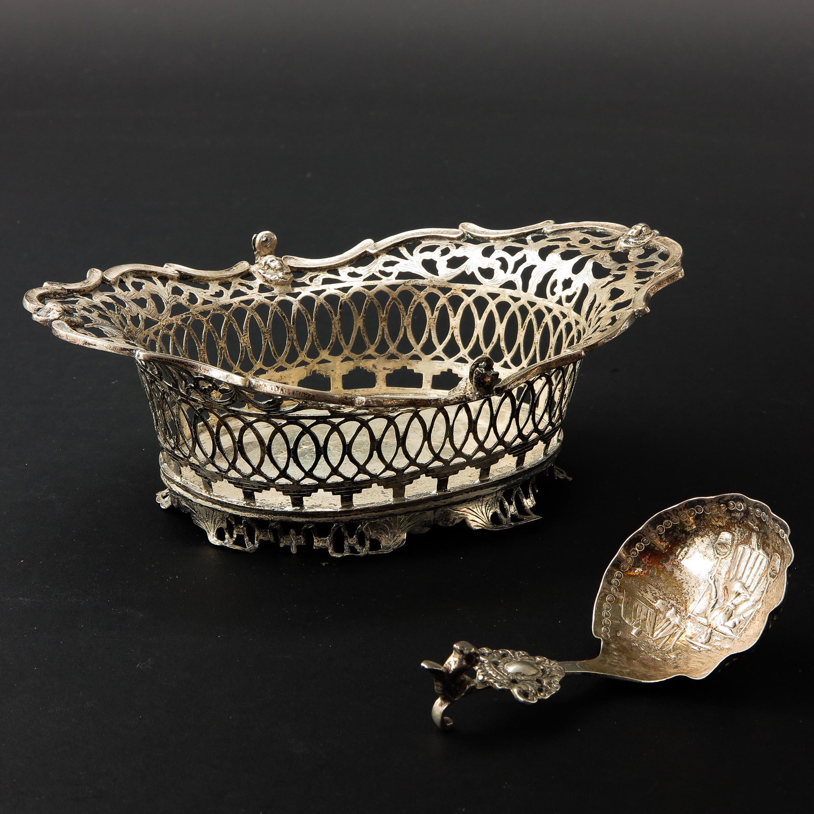 A Lot of Dutch Silver: Including cream spoon and bon bon basket, 20 cm. long.
