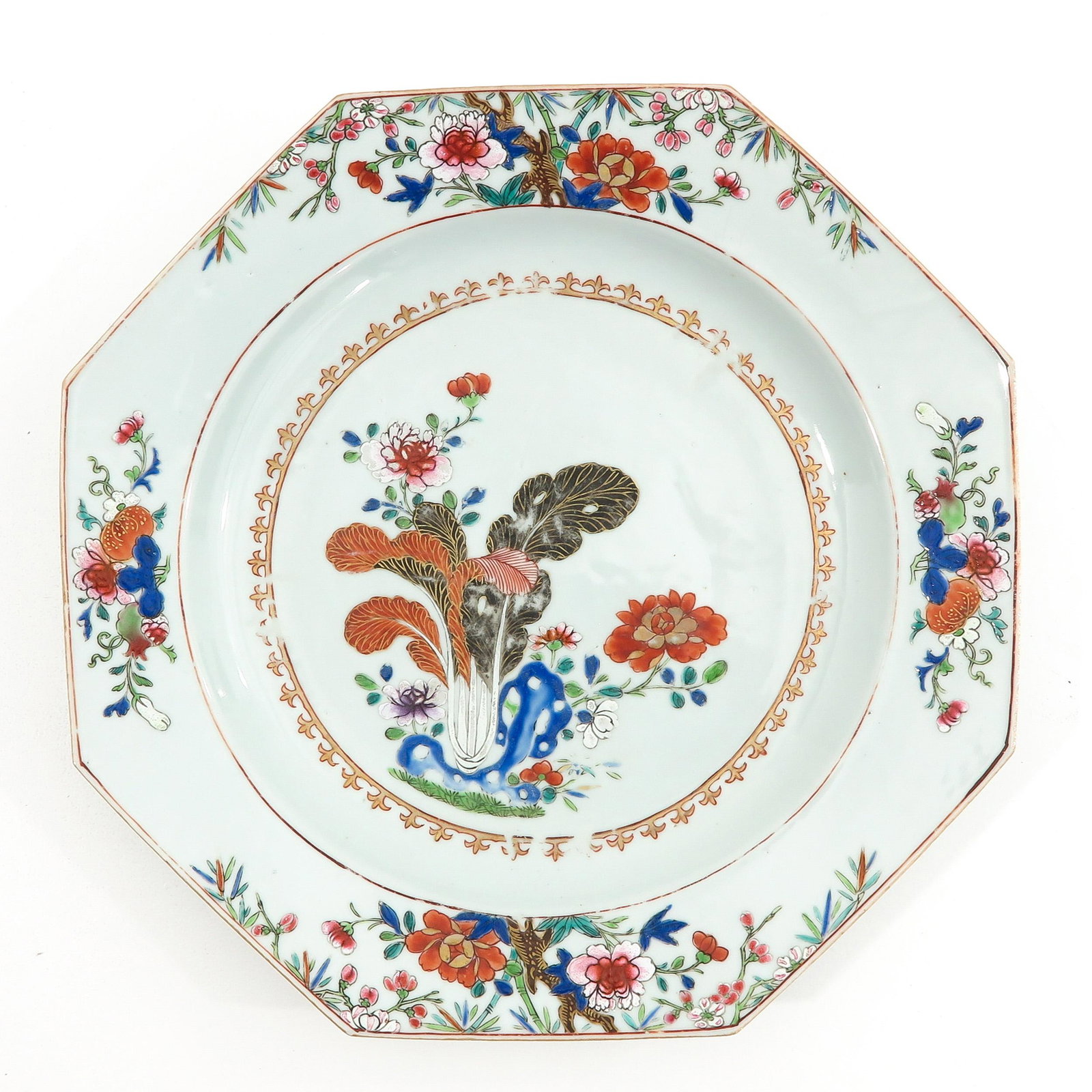 A Famille Rose Charger: Decorated with tobacco leaf and flowers, 18th Century, 30 cm. in diameter.