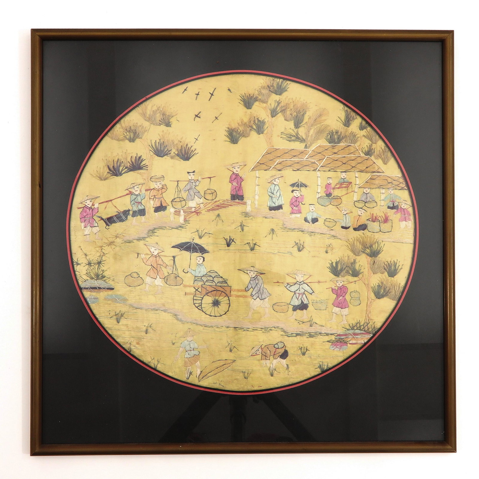 A Framed Chinese Textile: Depicting Chinese figures working in fields, 50 x 50 cm.