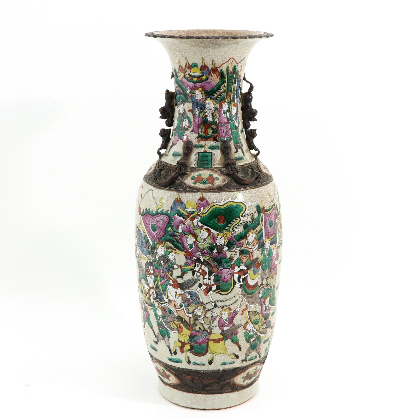 A Nanking Vase: Decorated with Chinese warriors, temple lions on handles, 61 cm. tall, small piece of handle is missing.