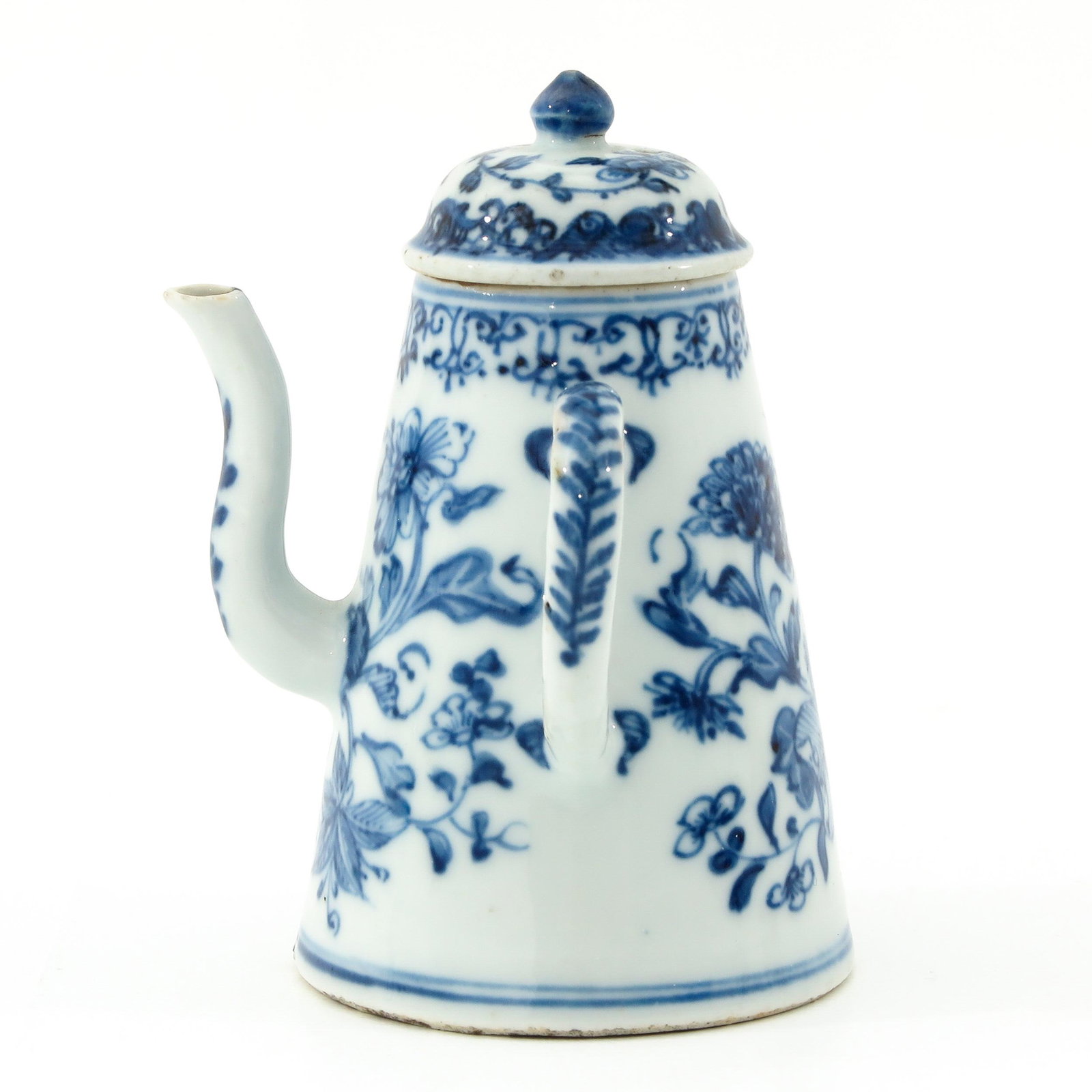 A Blue and White Chocolate Pot: Floral decor, 18th Century, 13 cm. tall, hairline.