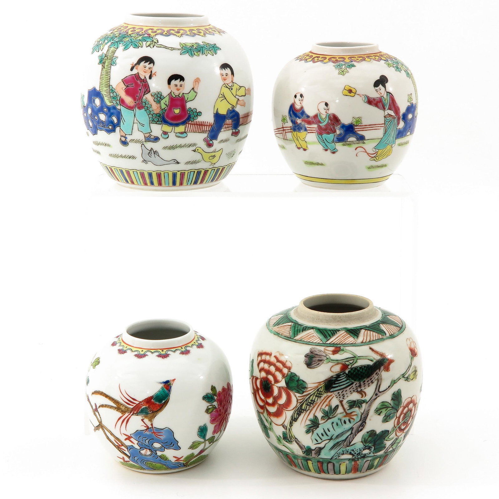 A Lot of 4 Ginger Jars: In diverse decors, 13 cm. tall.