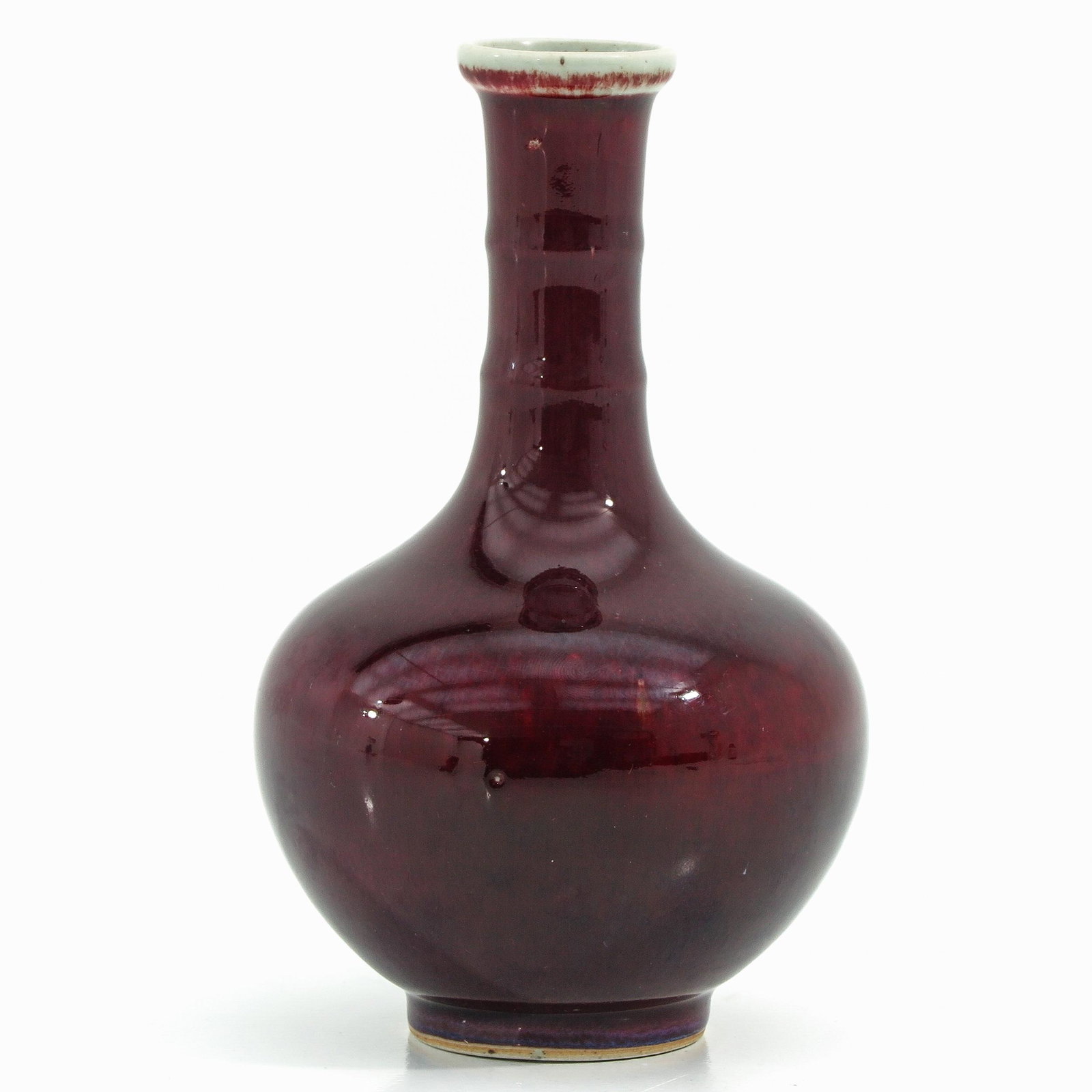 A Sang de Boeuf Decor Vase: Qianlong mark, 19 cm. tall.