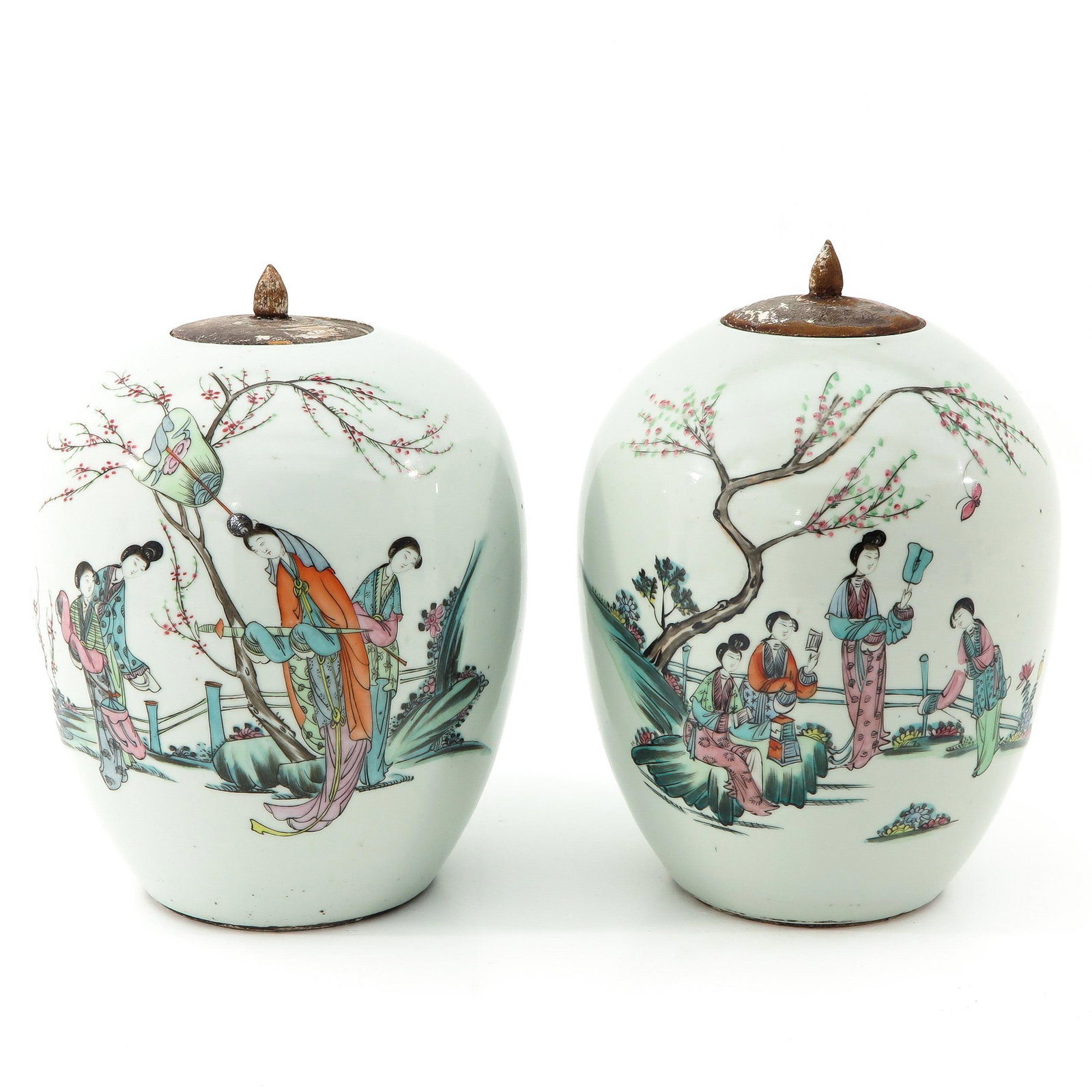 A Pair of Famille Rose Ginger Jars: Decorated with Chinese figures in garden with text, 30 cm. tall.